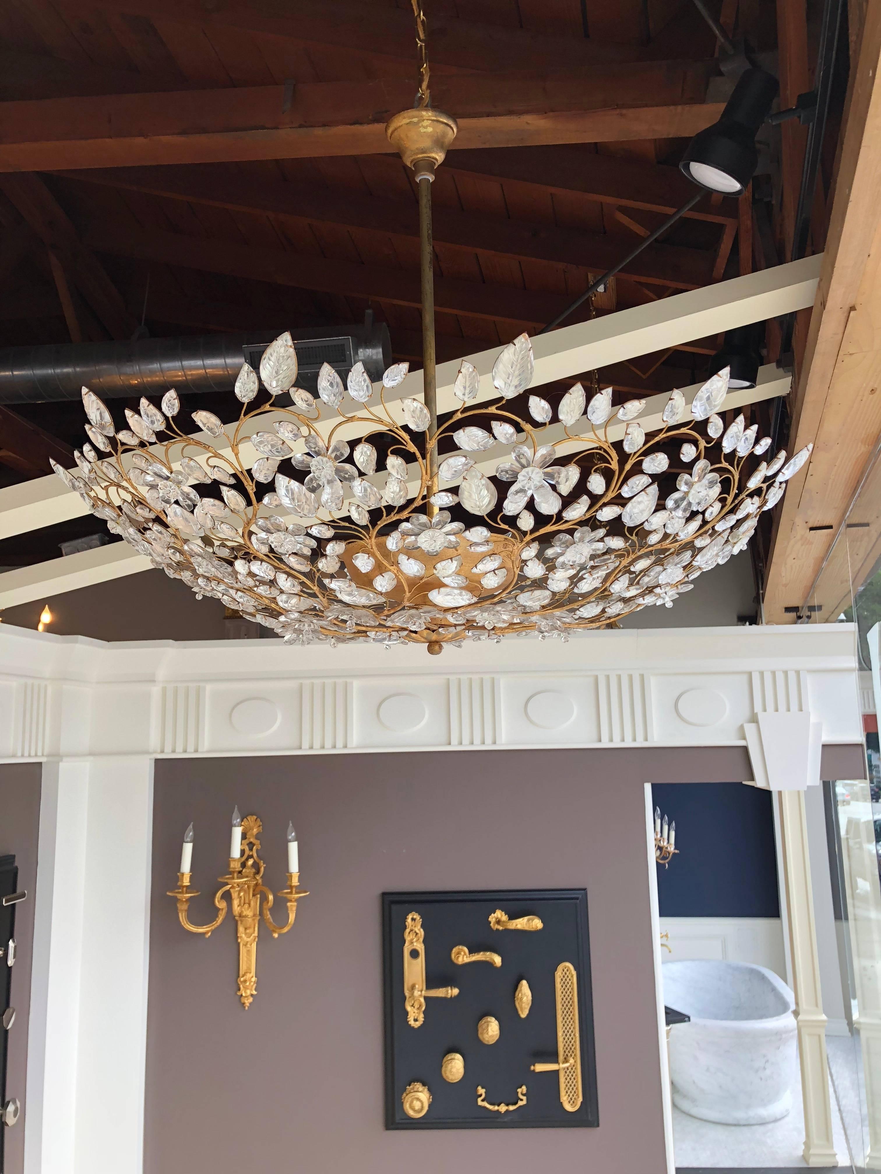 #18141 Maison Baguès chandelier, three lights, Finish: Gilt gold or gilt silver as needed. 4 lights
Iron and crystal (UL listing available for an additional fee). This is the larger size, we have a smaller one and also a ceiling light version as