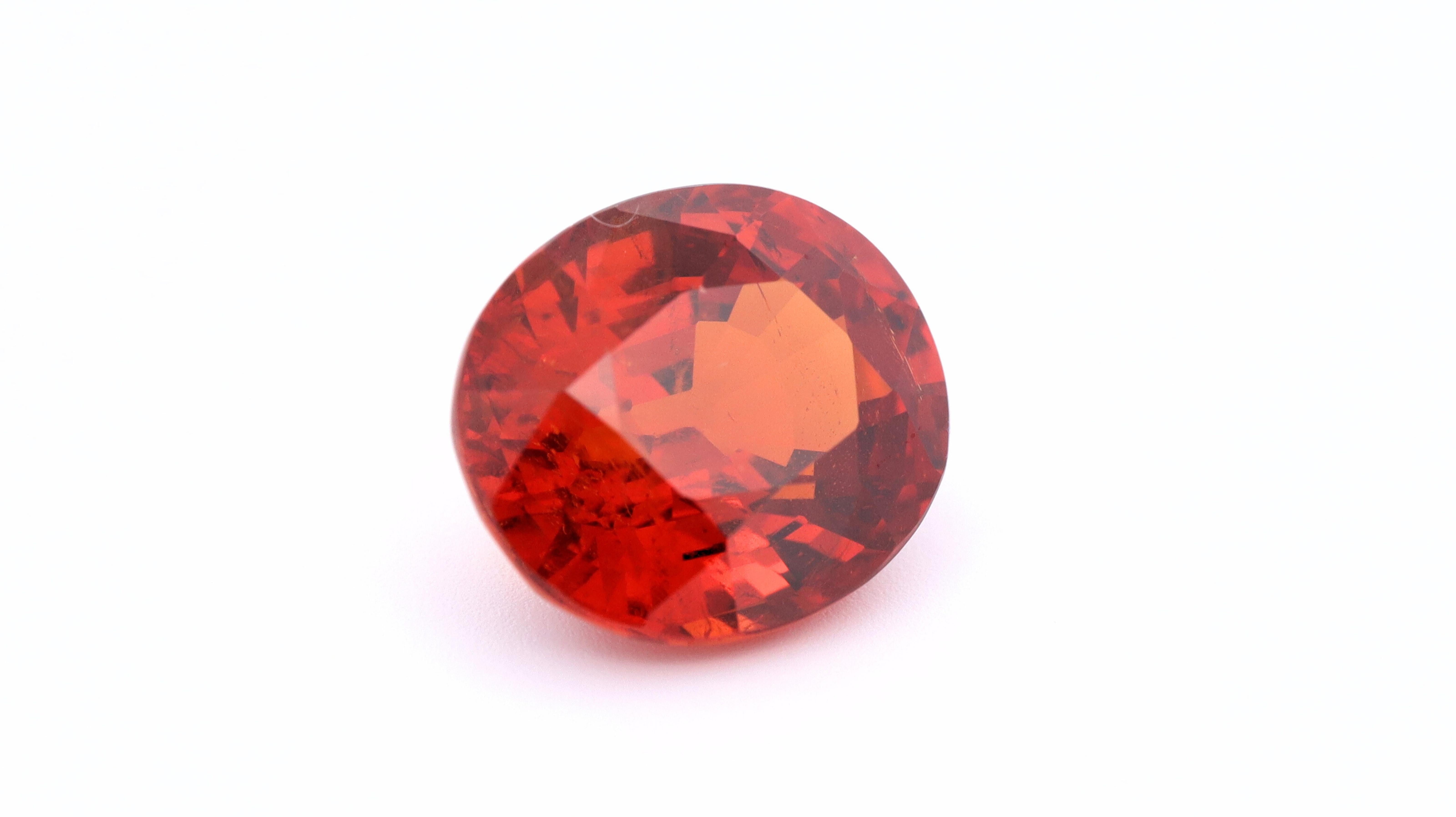 A natural certified Spessartine Garnet also known as Mandarin Garnet.

There are two well known varieties of orange garnets, Hessonite, which tends to be readily available and less hard, and Spessartine garnet, as this stone, which is rare and