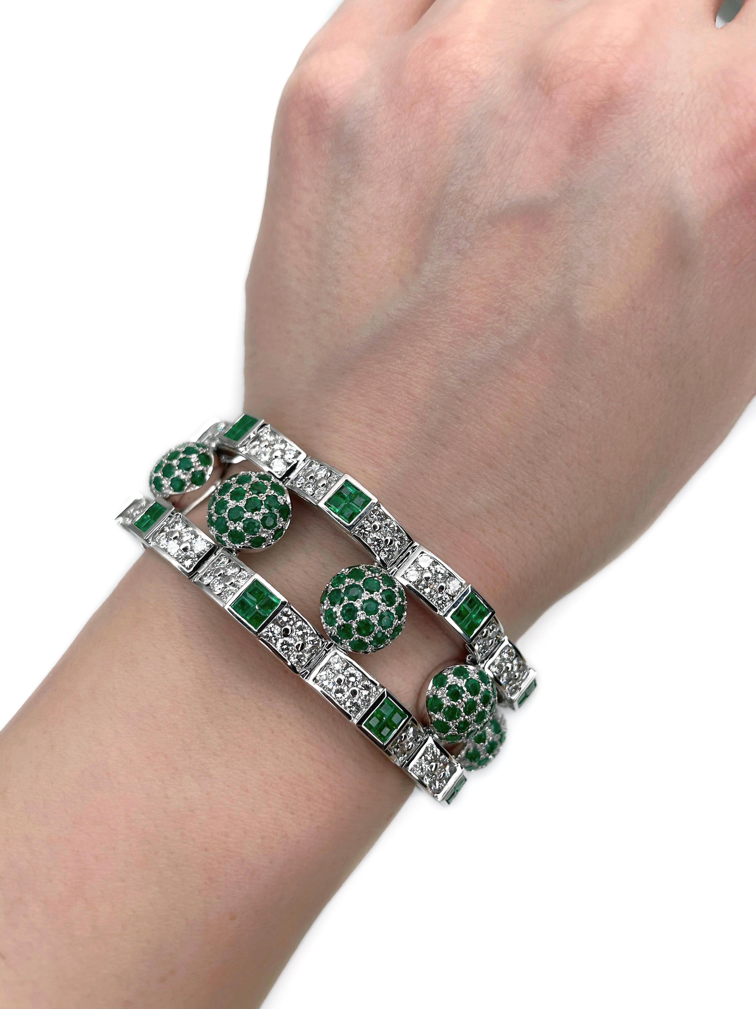 This is a luxury hinged bangle bracelet designed by famous jewellery company Mouawad. It is crafted in 18K white gold. 

The piece is certified by the Assay Office with a gemstone testing report (can be found in photo gallery).

The bracelet is set