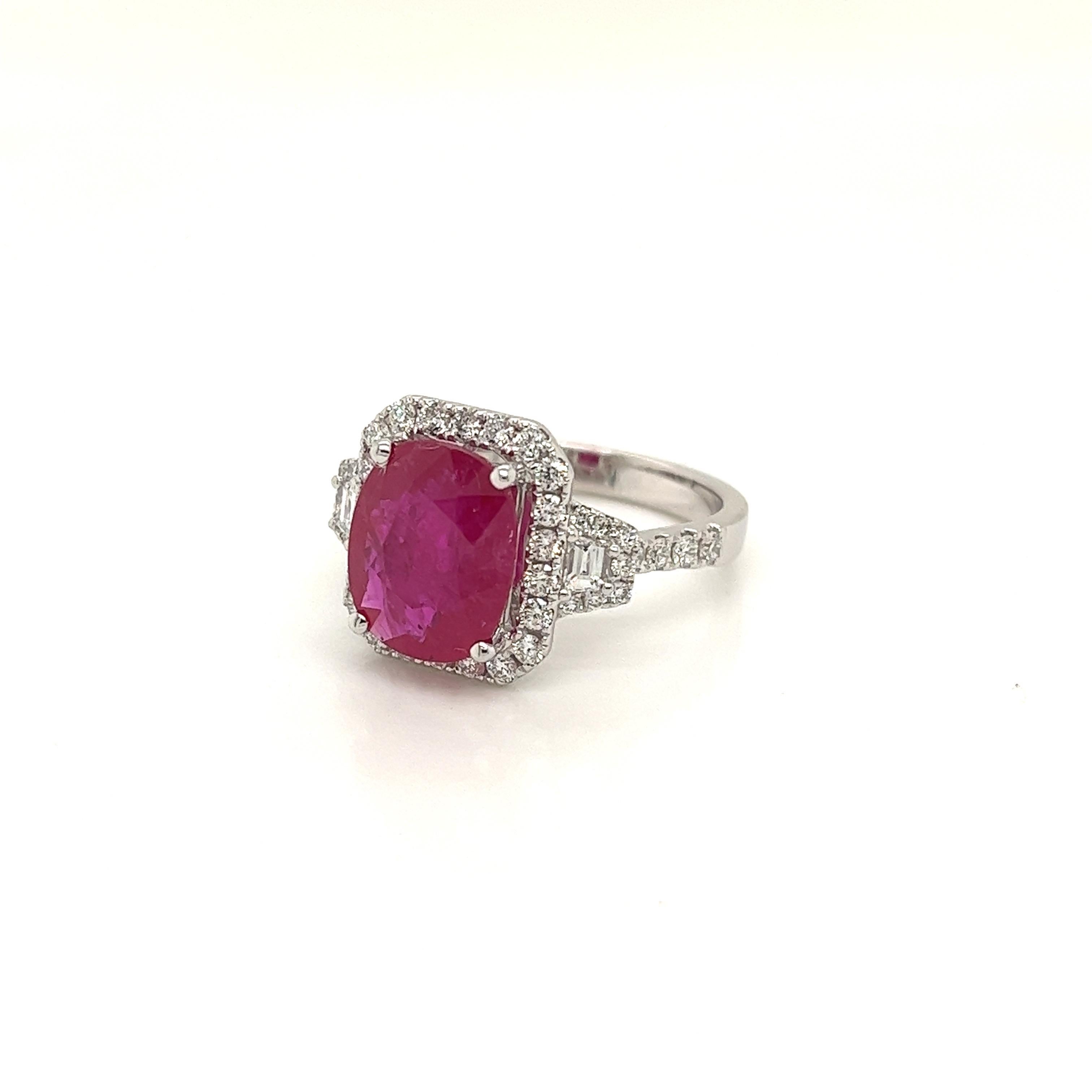 Certified Oval Mozambique Ruby weighing 4.39 carats
Measuring (10.93x9.04x4.78) mm
Diamonds weighing .76 carats
GH-SI1
Set in 18k white gold ring
4.89 g
