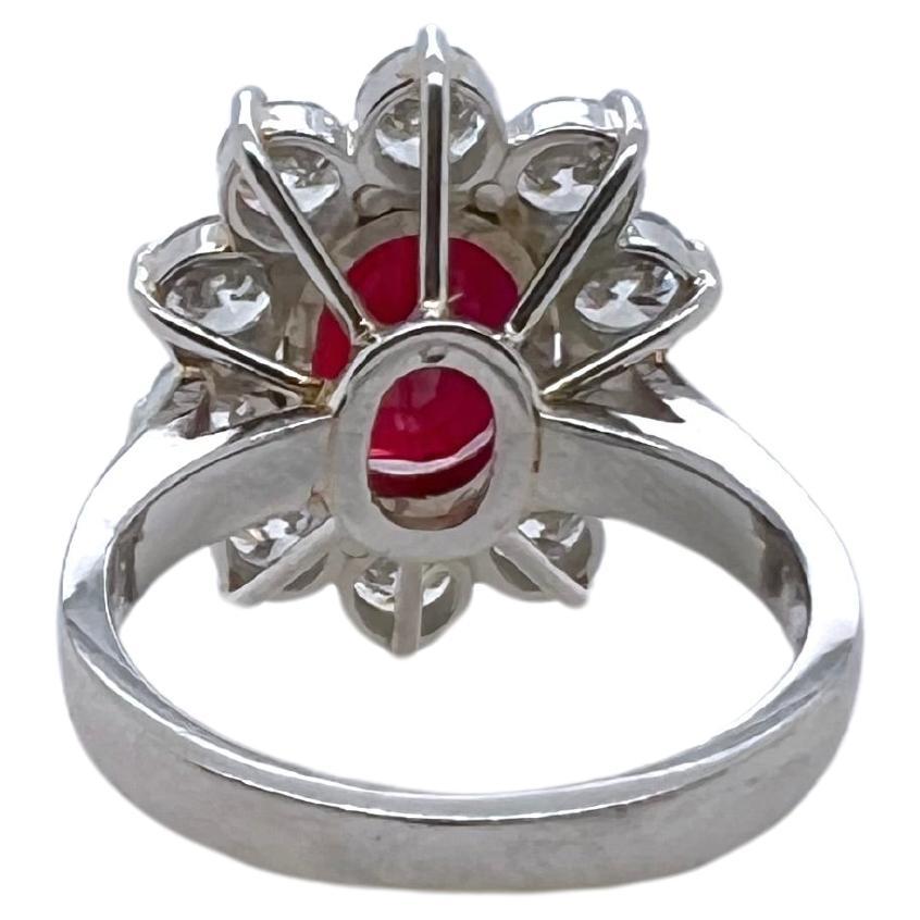 Contemporary Certified Mozambique Ruby with GIA Certified Diamond Platinum Ring For Sale