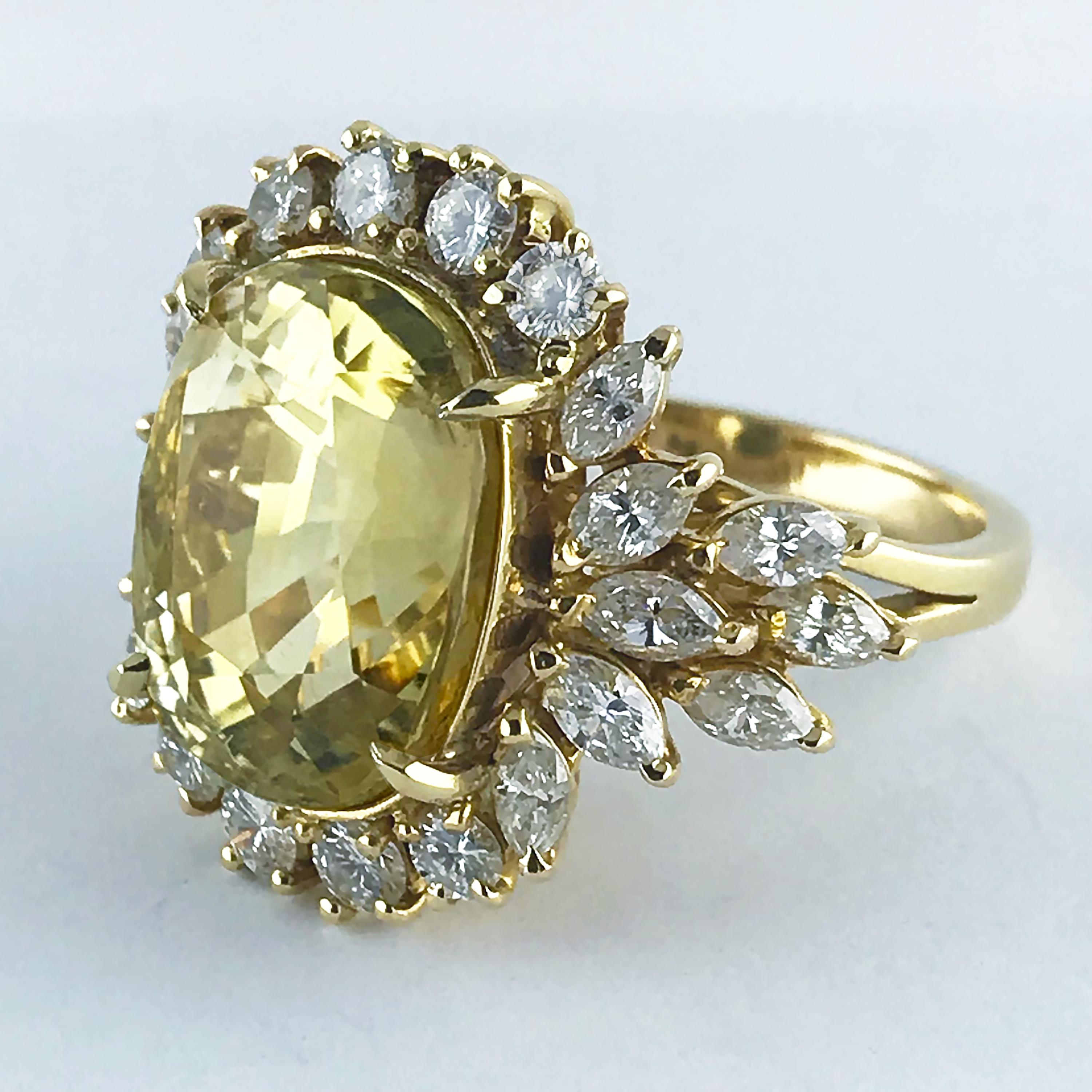 Vintage ring with a large rare natural, untreated, yellow sapphire, handmade in England, circa 1960.

Central Ceylon (Sri Lanka) yellow sapphire, cushion cut, weighing 16.39ct, certified, natural untreated colour. 

The sapphire surrounded by