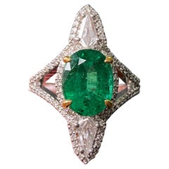 Bague en or blanc 18 carats avec émeraude zambienne et diamant certifiés naturels