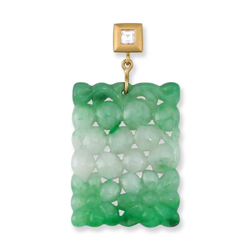 Gorgeous vivid natural green jadeite color in an amazing carved pendant. This natural green jadeite jade rectangle with carved floral motif is 18.2mm wide, 25.2mm high and 3mm thick, set with an 18K satin yellow gold bail with .09ct Carre cut square