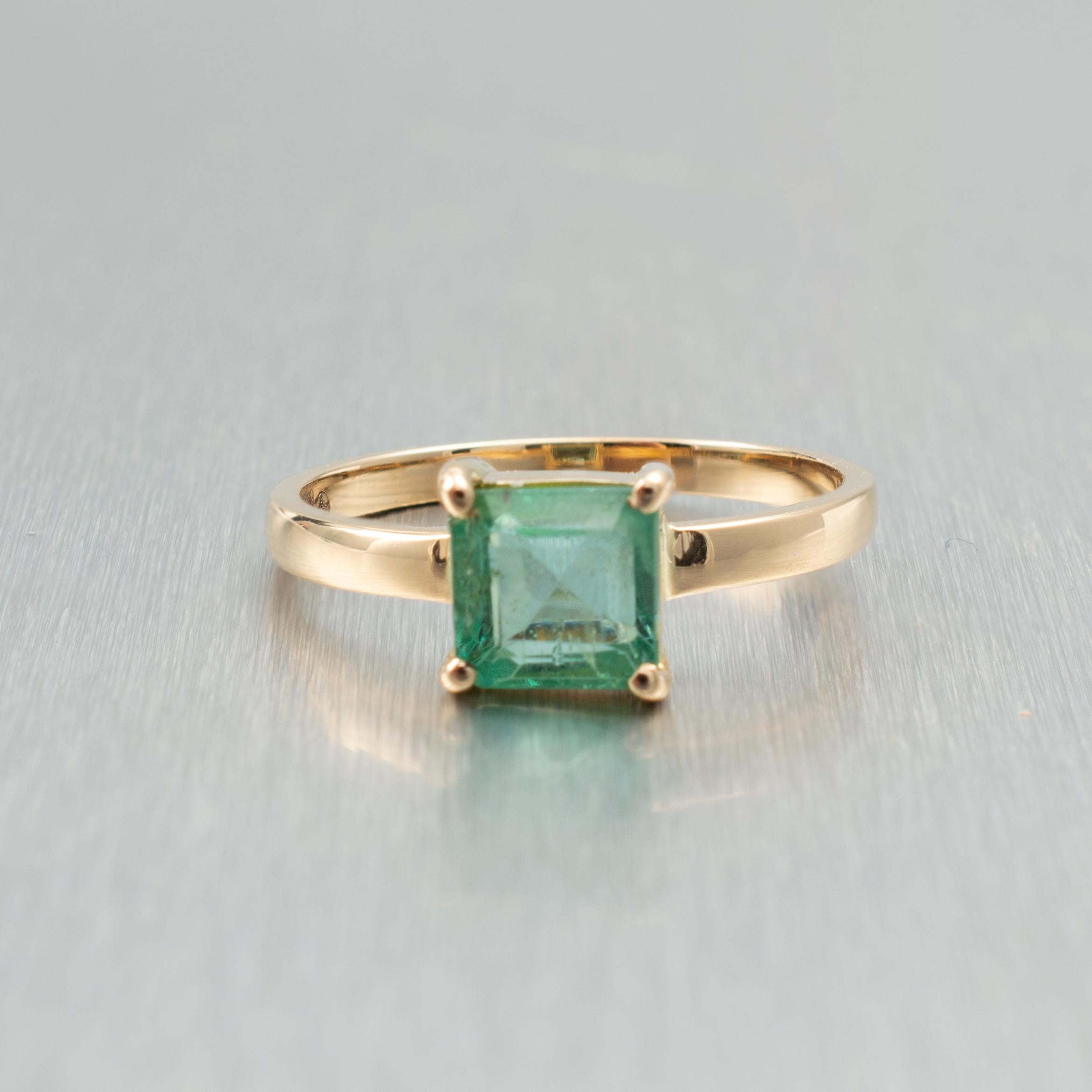 This Emerald solitaire ring, crafted in 18 karat yellow gold, displays a gorgeous natural gemstone that is approx 1.5 carats. The natural Columbian emerald has a lovely translucent shade of green showing its natural inclusions.

The ring is fully