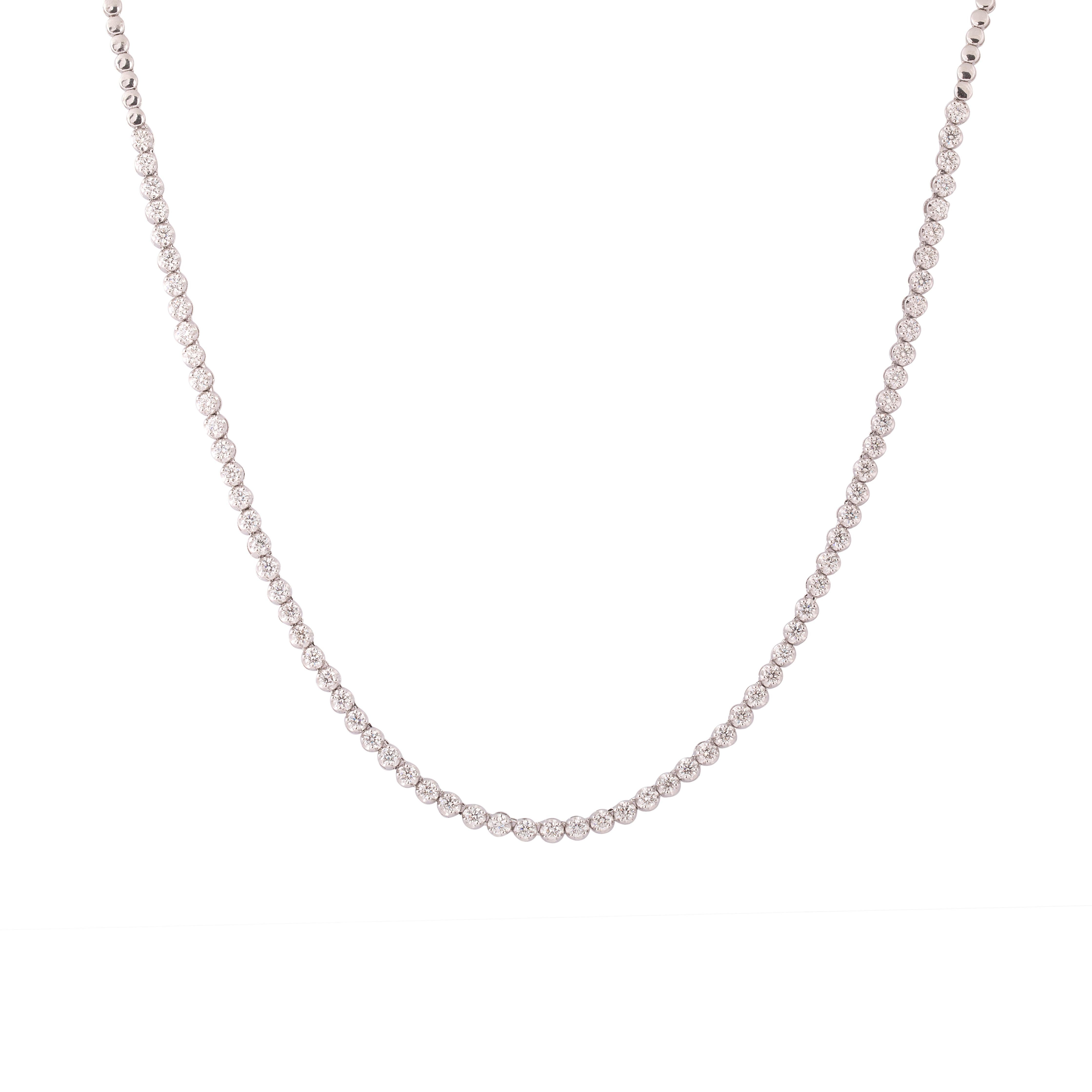 Crafted in 26.46 grams of 14-karat White Gold, The Gitcha Necklace and Earrings Jewelry Set contains 67 Stones of Round Diamonds with a total of 2.46-Carats in F-G Color and VVS-VS Clarity. The Necklace is 17-inch in Length.

CONTEMPORARY AND