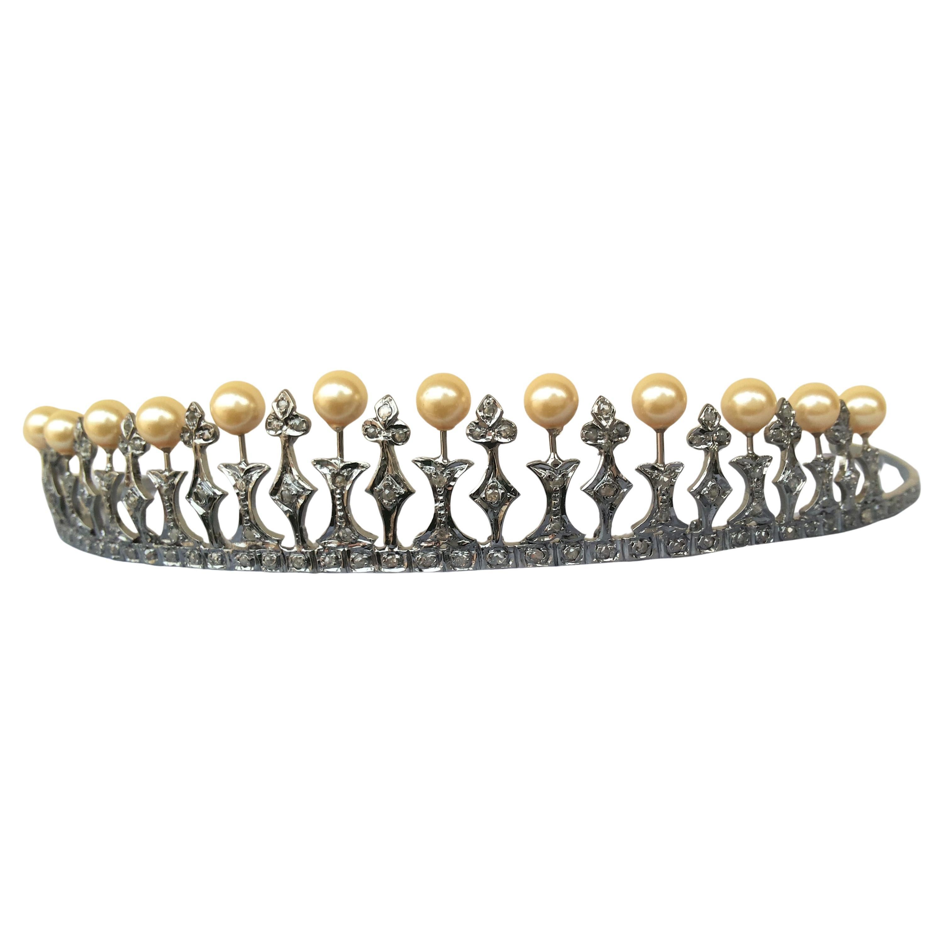 This Vintage tiara is a symbol of beauty and self-love. It is handmade with Natural rose cut diamonds and Pearls in sterling silver. 
Diamond- Rose cut diamonds
Diamond color- White with a tint of grey

Gemstone type- Pearls
Gemstone origin- Natural