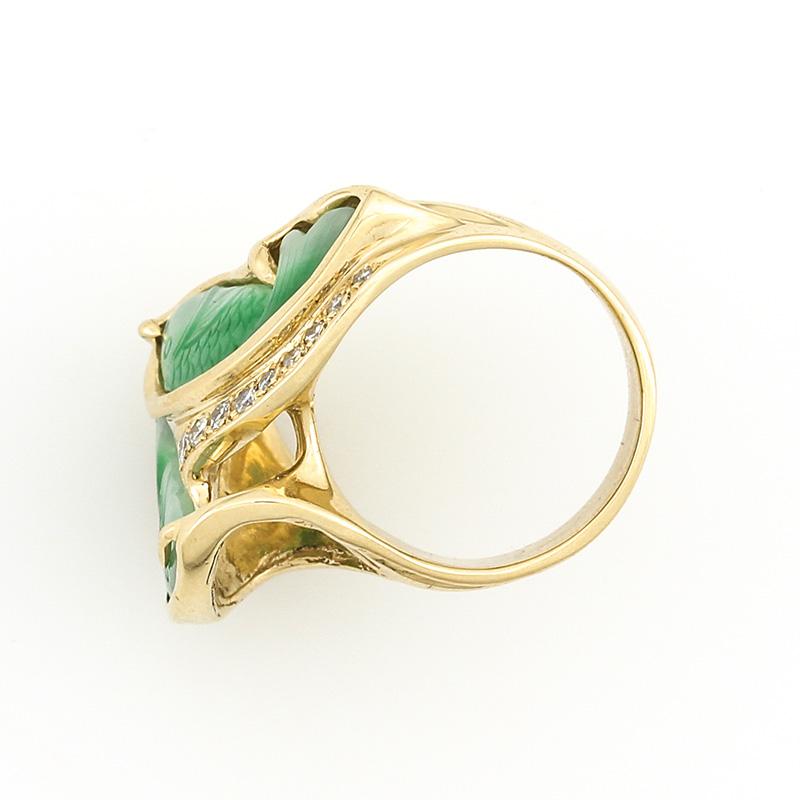 One-of-a-kind & fabulous! Know someone that love fish and the symbolism of fish? This is the piece! Two beautifully carved natural green jadeite jade fish set in a heavy 14K yellow gold estate ring with .23cts of diamonds. Finger size 6.75, but
