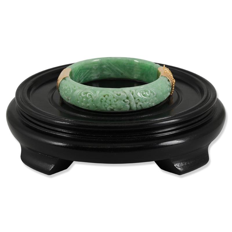 An Apple Green Jade Beauty! Beautifully carved floral motif certified natural apple green jade hinge & clasp bangle bracelet. The bangle has a 56+mm inside diameter which translates to a 7