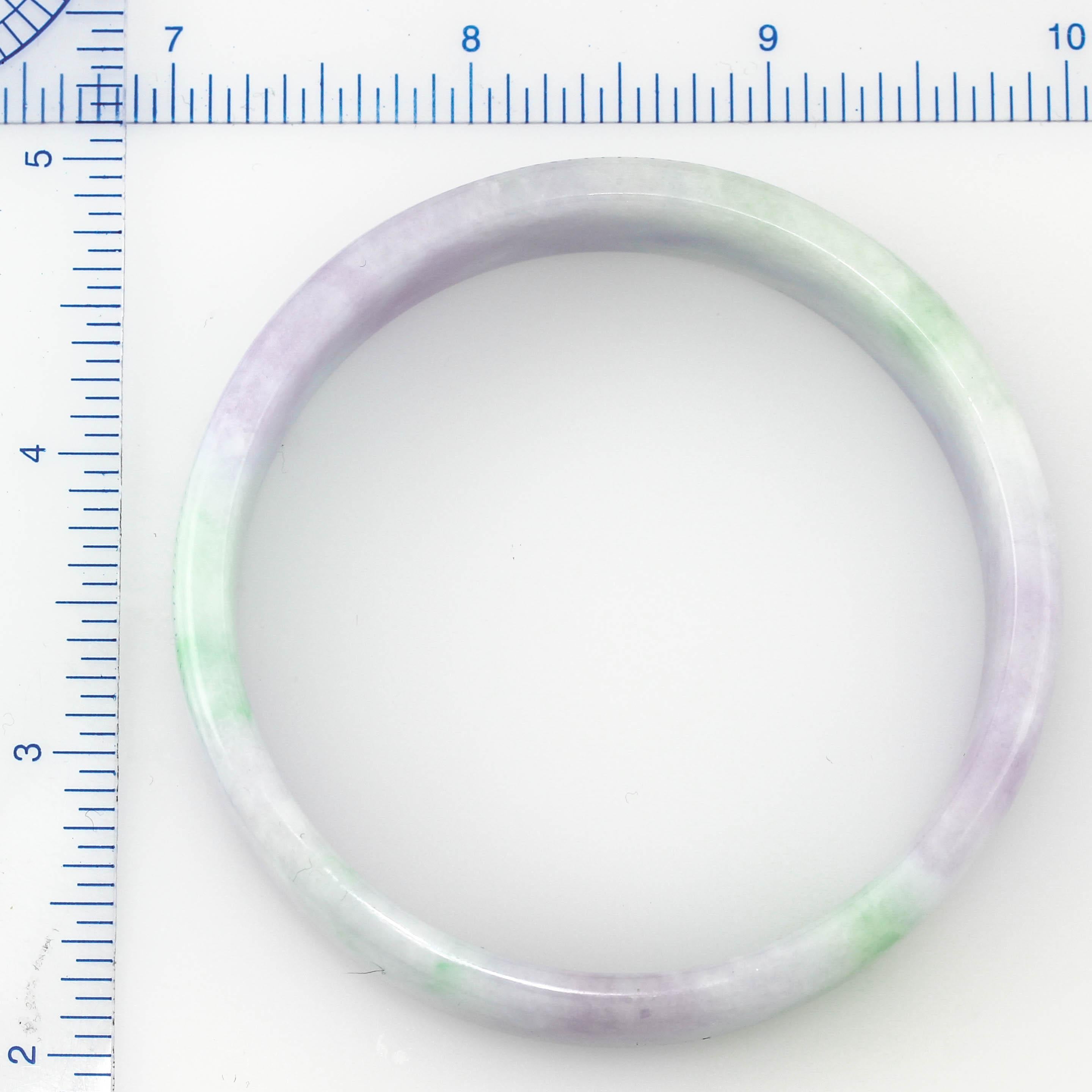 Truly gorgeous and one-of-a-kind! And a GREAT size! We do not often see a natural jade bangle beauties in this large a size. This pastel delight ranges in color (natural color) from light to vivid green to light to vivid lavender all in one piece.