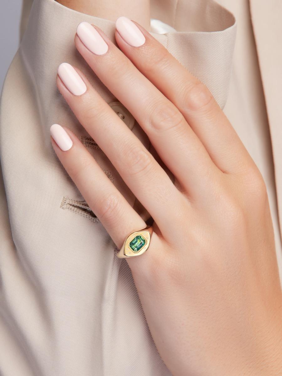 A spattering of sparkling diamonds encircle a striking emerald-cut green sapphire in the centre of our Green Sapphire Signet Ring, for a piece that’s uncompromising on glitz and glamour

Materials: 

Gemstone: natural green sapphire - certified
