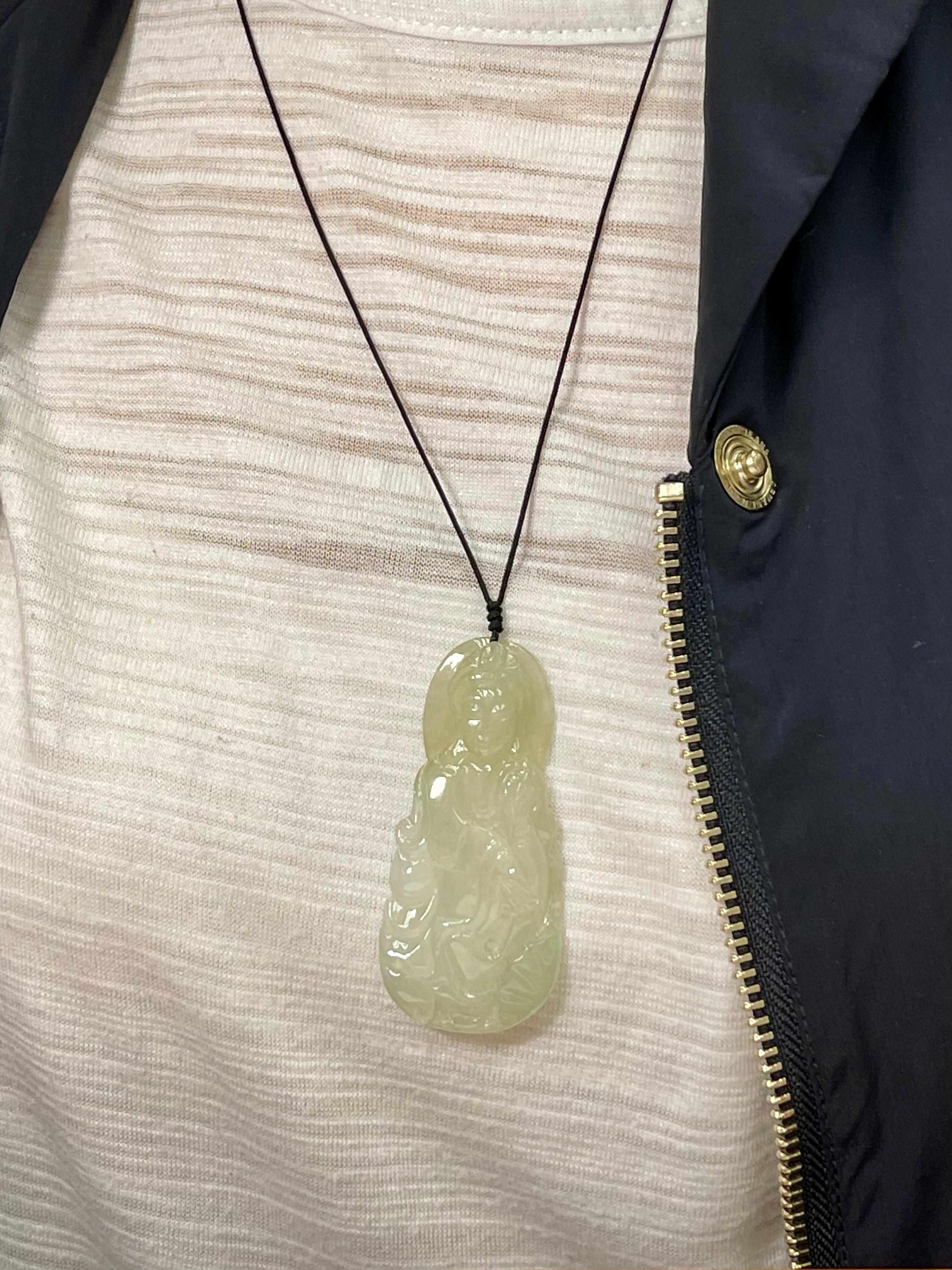 Please check out the HD video! This is a very well carved Kwan Yin jadeite Jade pendant. It is certified. The lines and details of this piece are excellent. This natural jadeite Jade pendant is colorless and transparent, also know as icy jade. This