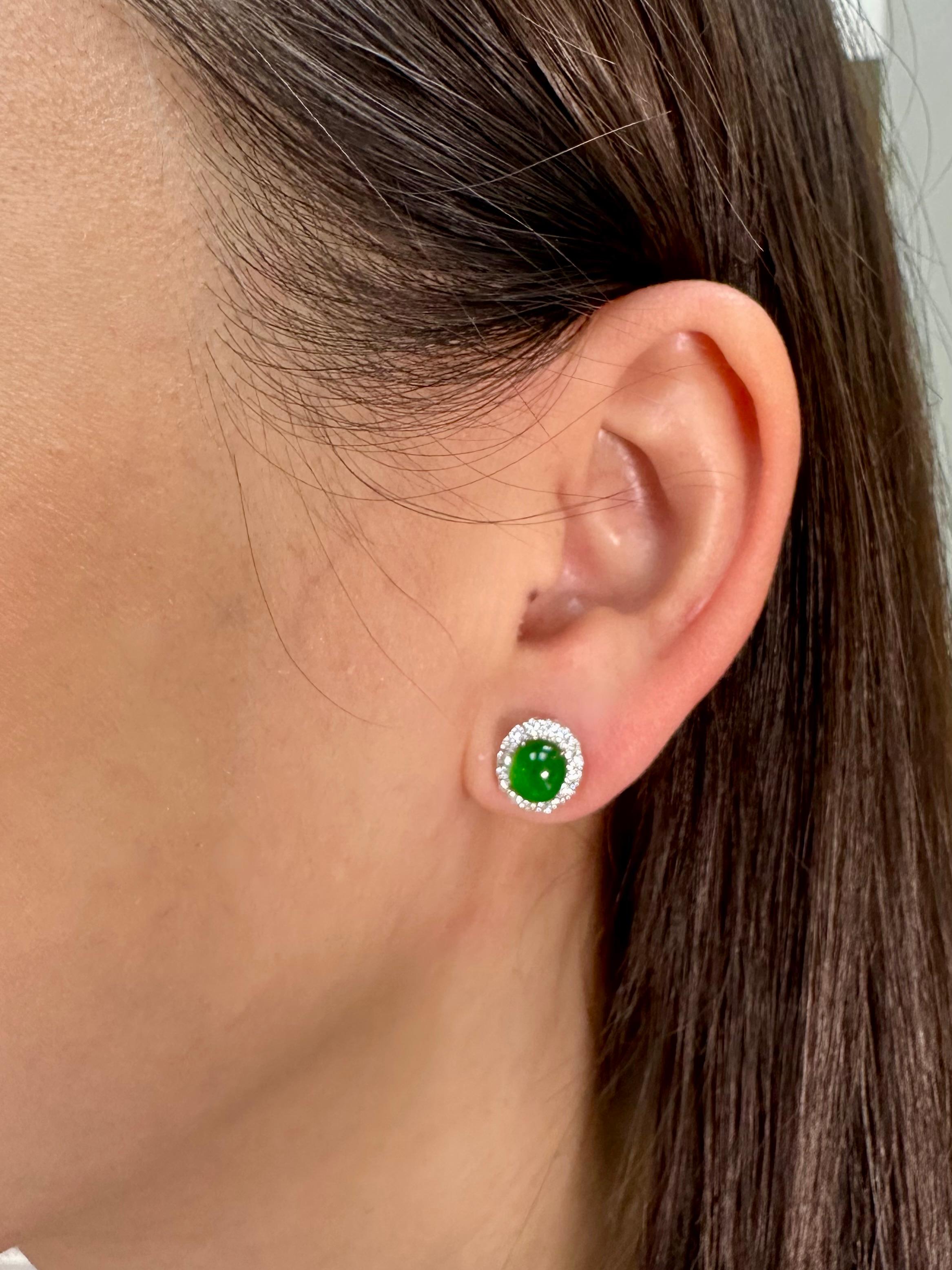 Please check out the HD video! It doesn't get much better than this! Here is a nice pair of true imperial green Jadeite Jade earrings. It has the best of the best glowing green color. The earrings are about 10.0mm each in outer diameter. The jade