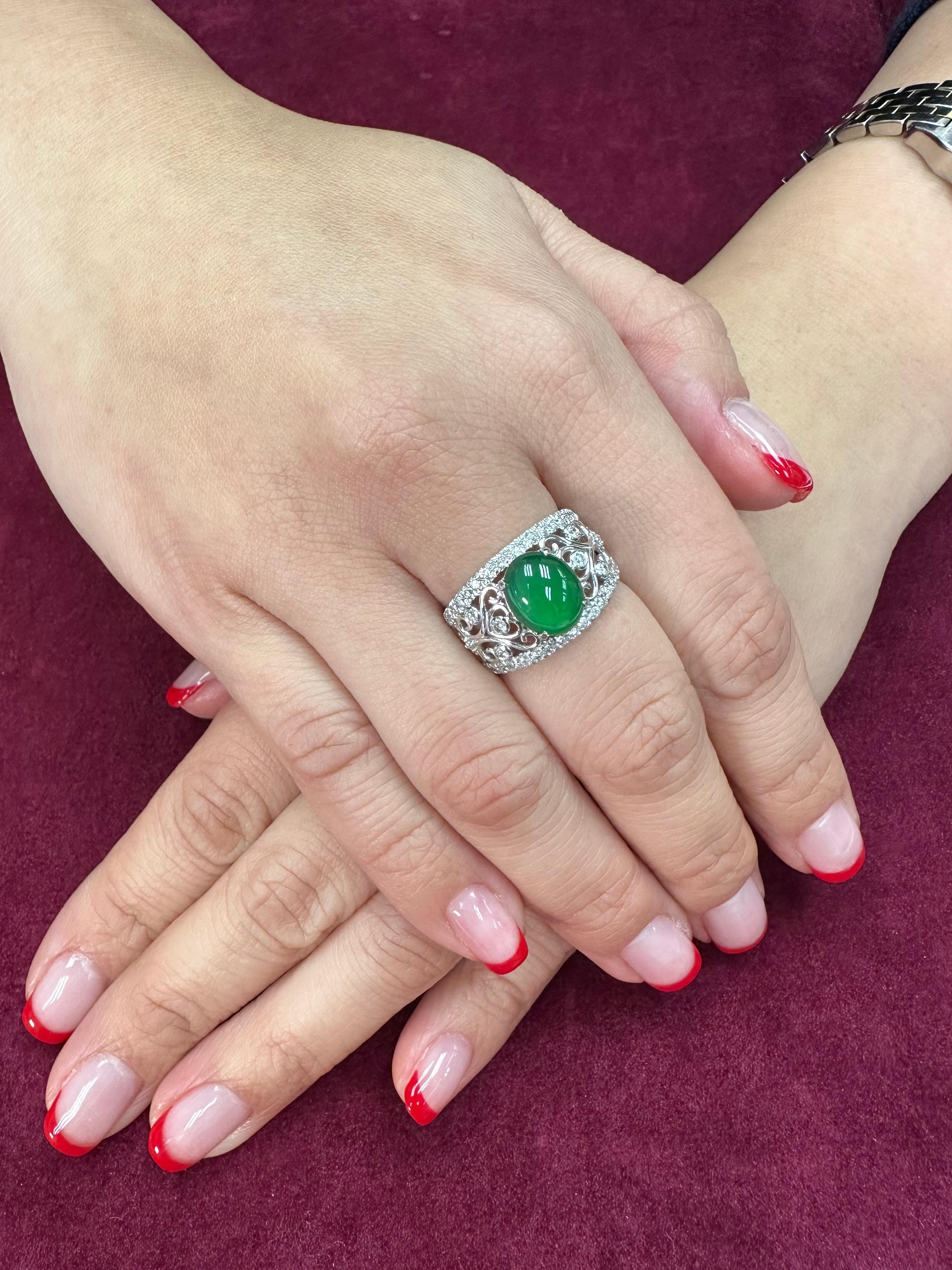 Please check out the HD video. This ring has the best imperial green color, it GLOWS! The material used to make this impressive cabochon is called the heart of the jade. Meaning the center best best part of the jade! It is certified natural jadeite