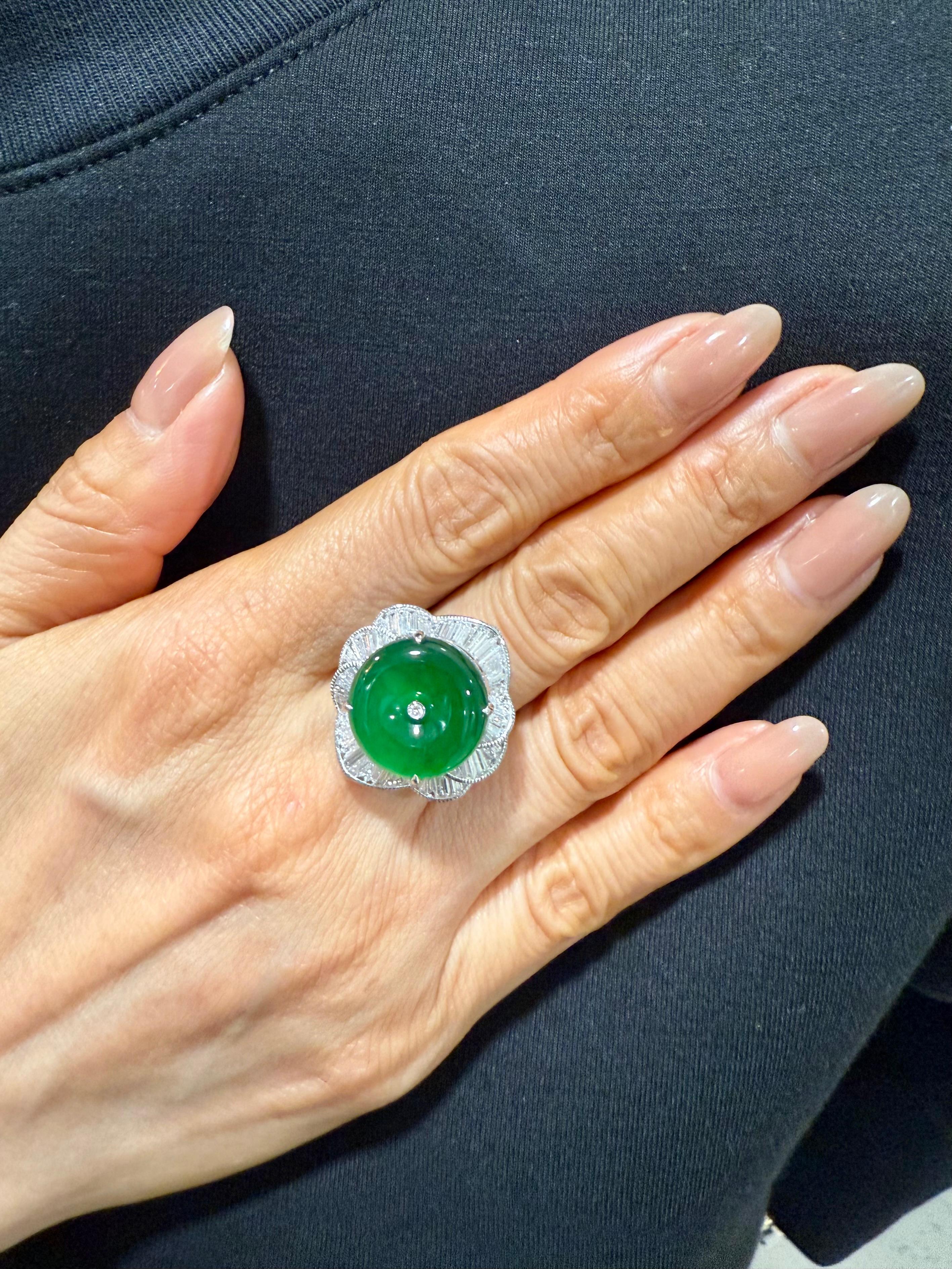 Please check out the HD video. Here is an impressive imperial green Jade cocktail ring. Almost all jades of this color and quality are treated with color enhancement. This one is certified natural and without any treatments. This ring is set in 18k