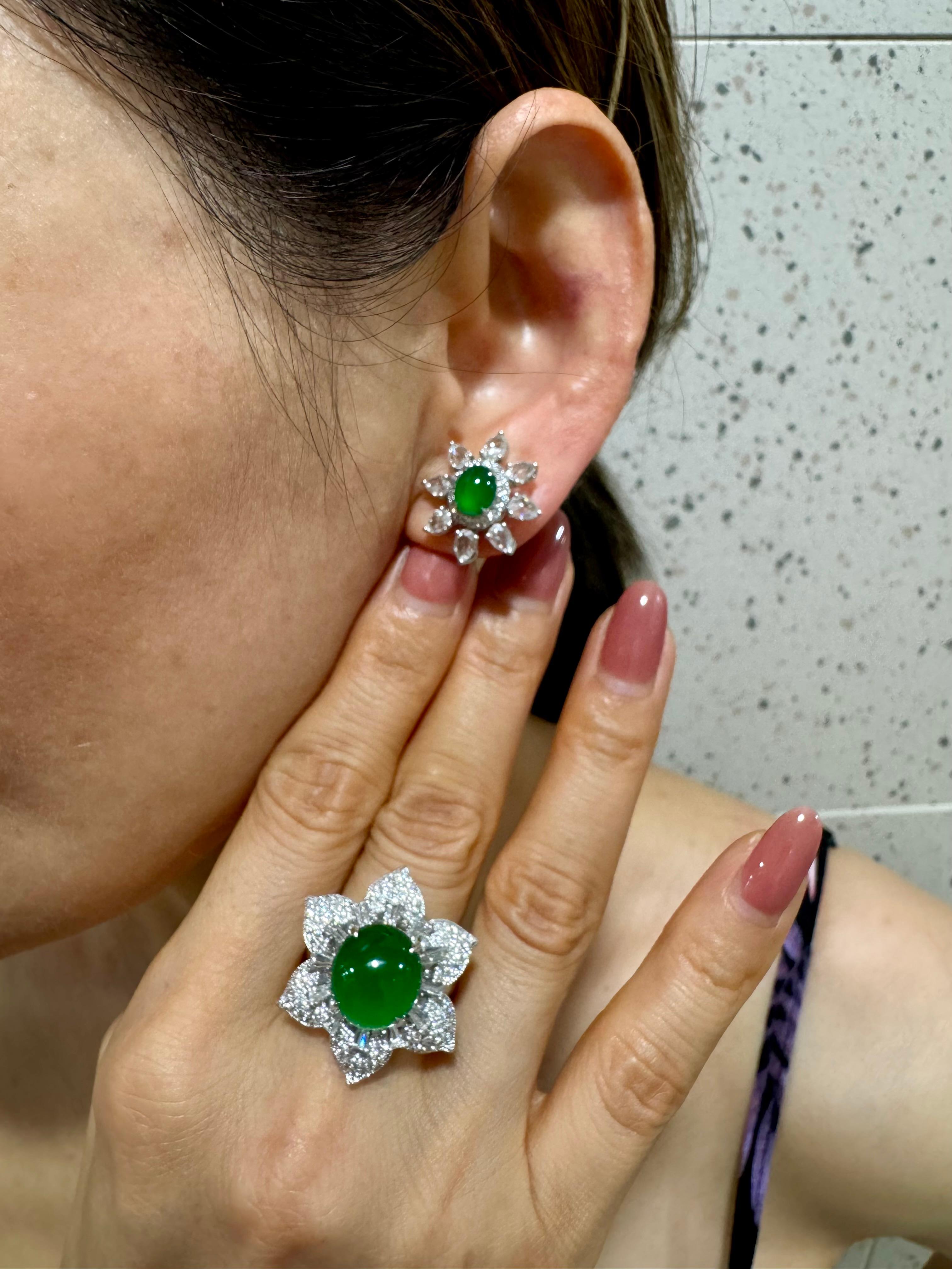 Please check out the HD video. Here is an impressive and substantial imperial green Jade cocktail ring. Almost all jade of this color and quality are color treated. This one is certified natural and without treatment. The center jade cabochon is