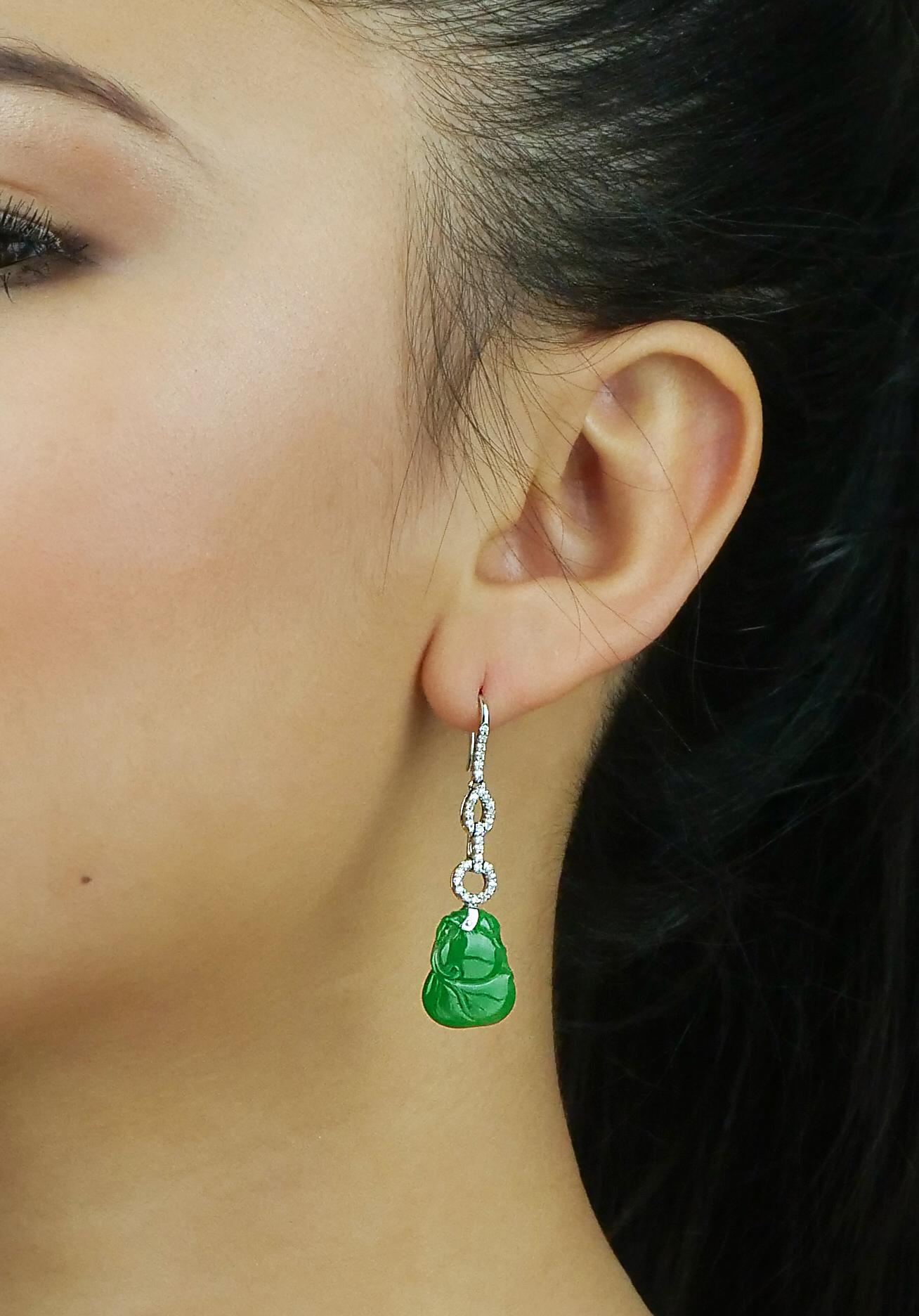 Stunning jade earrings in Gourd Bottle Shape is a symbol of the Chinese Xian immortals. Dangled by various shapes of links, circular and oval white gold links covered in glistening diamonds. The jade is calm and cooling and has a gorgeous sheer