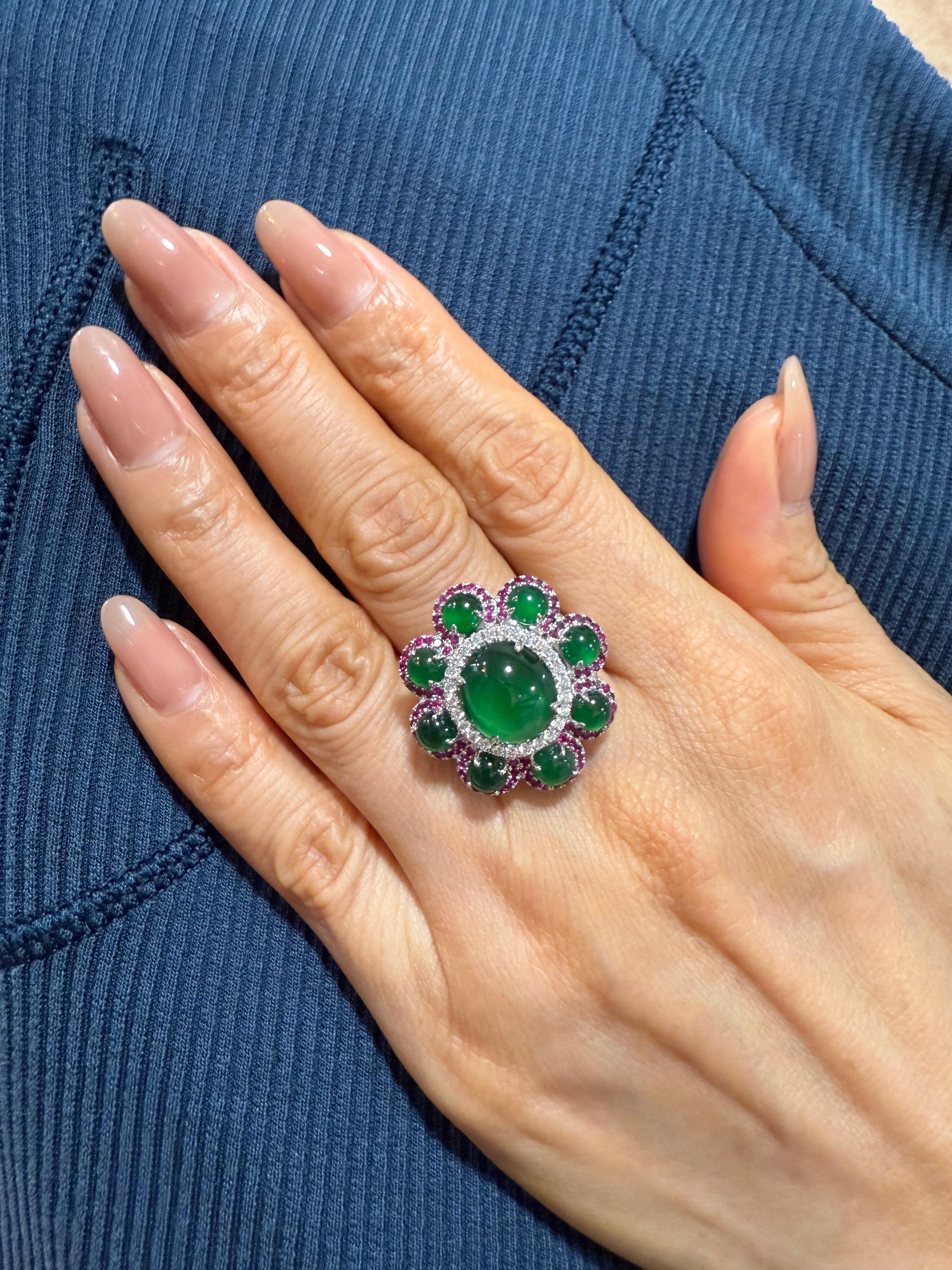 Please check out the HD video. Here is an impressive imperial green Jade cocktail ring. Almost all jades of this color and quality are treated with color enhancement. This one is certified natural and without any treatments. This ring is set in 18k