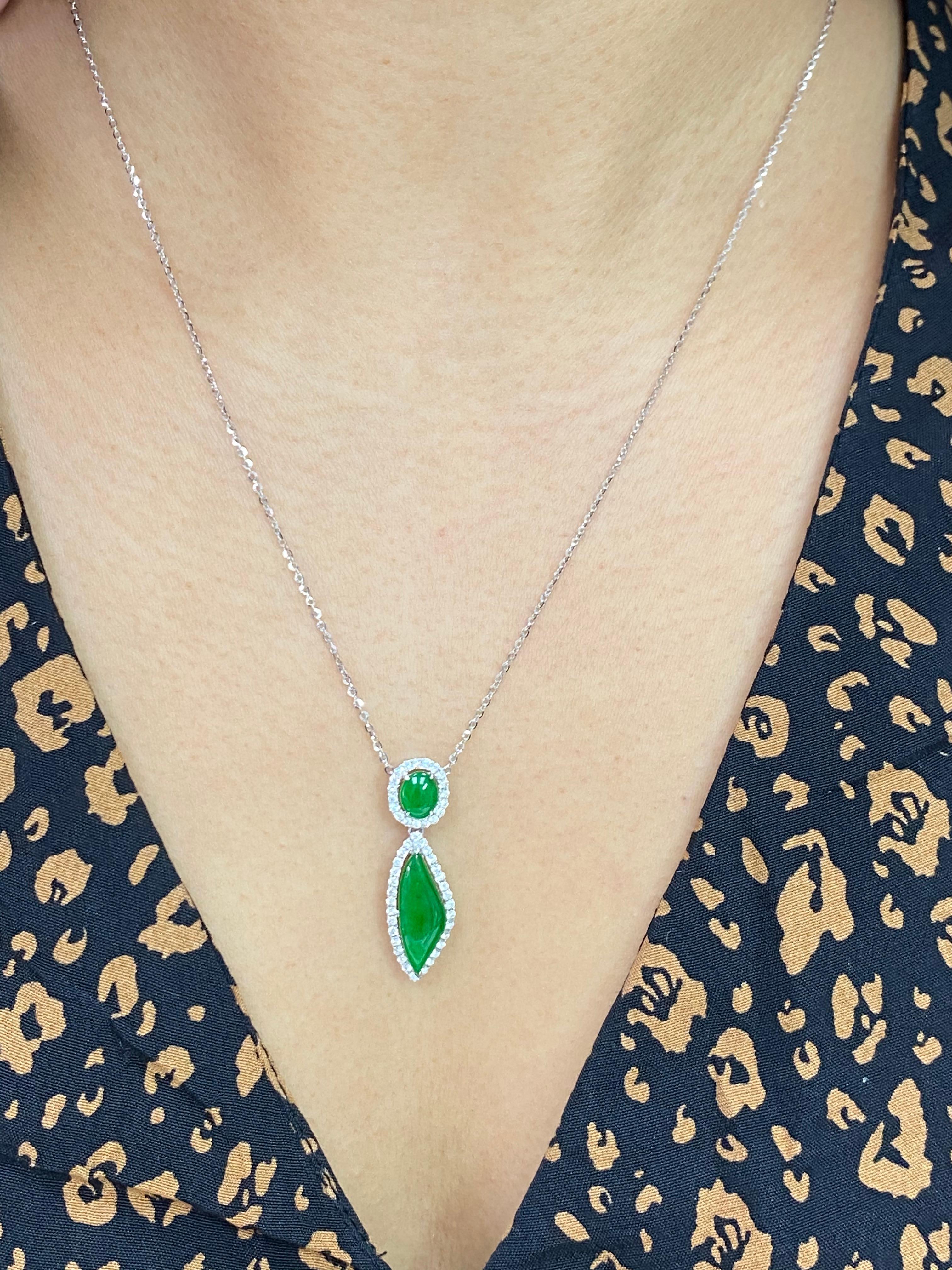 Here is a rare imperial green Jade and diamond pendant. It is certified. The pendant is set in 18k white gold and diamonds. This jade has the best color. The jade material used is the center of the rough (best material). There are diamonds that