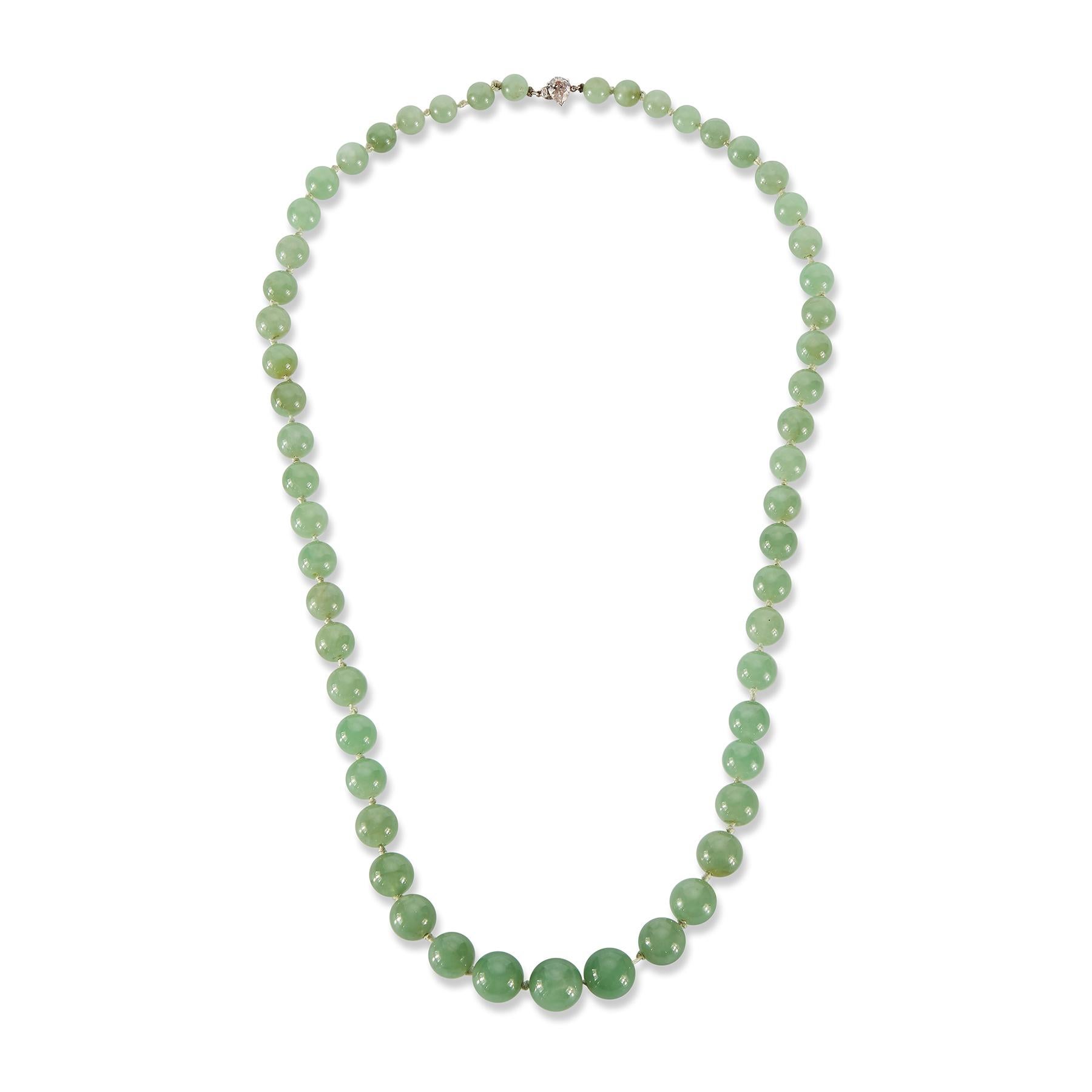 Certified Natural Jadeite Jade Bead Necklace

This necklace is set with translucent round green beads including a pear shape diamond clasp.

With GIA certificate stating the jade is natural, with no treatment.

Length: approximately 25 inches