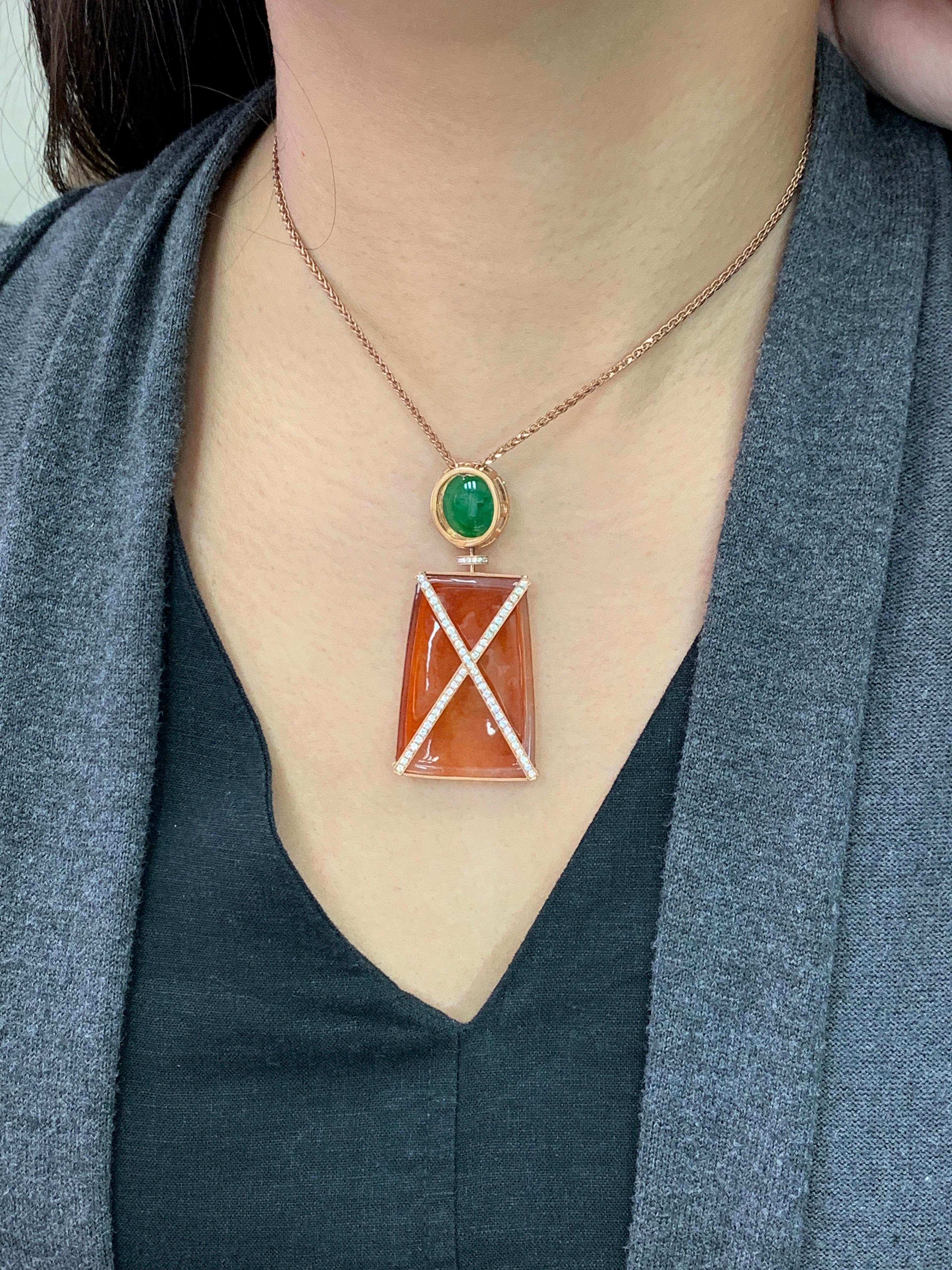 Please check out the HD video! Red jade of this quality is very rare. A very unique design that is reversible. This gives the wearer a different look from front to back. Here is a nice Jade pendant made with an eye catching brown (almost red)