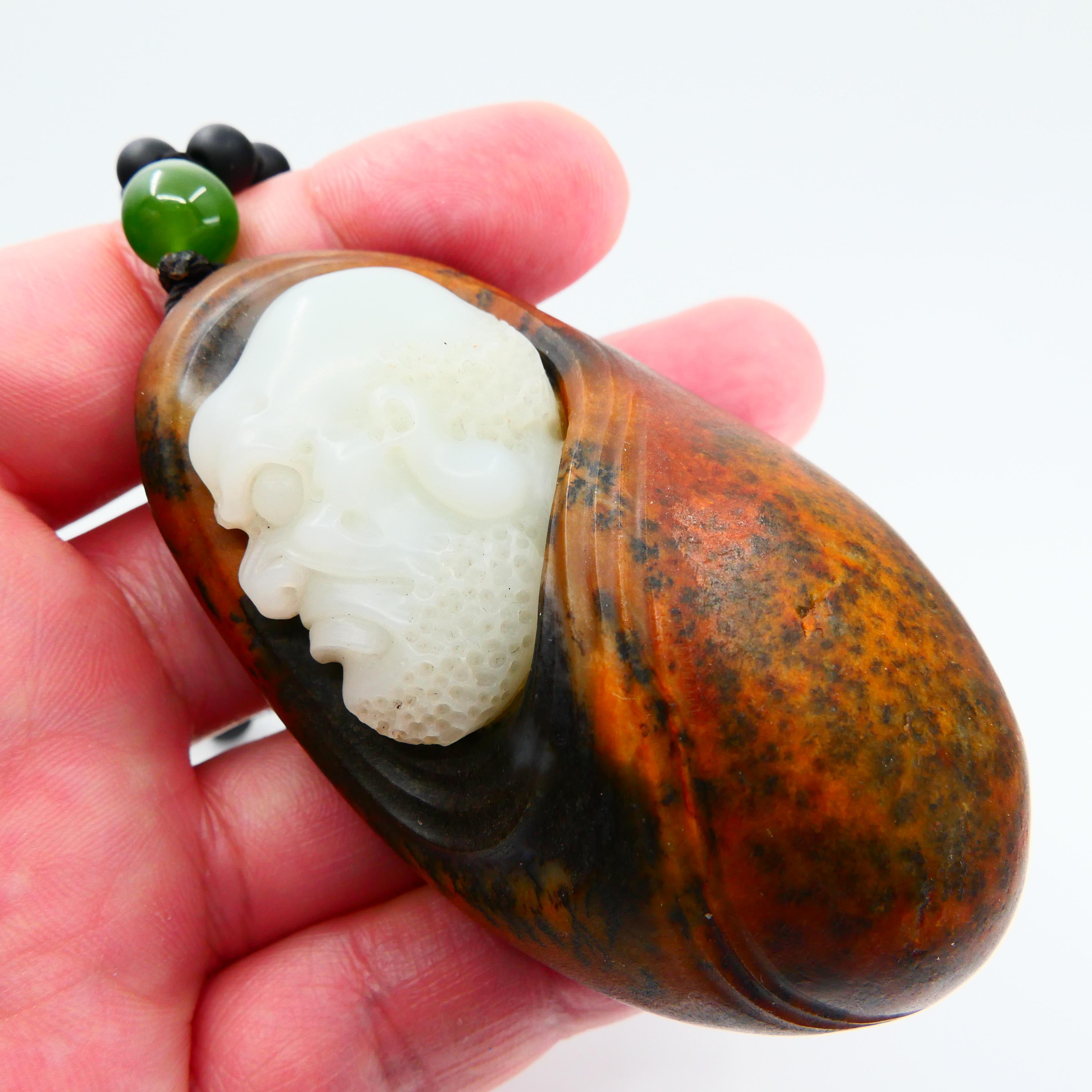 From our extensive Jade collection......This master piece is certified natural nephrite jade 