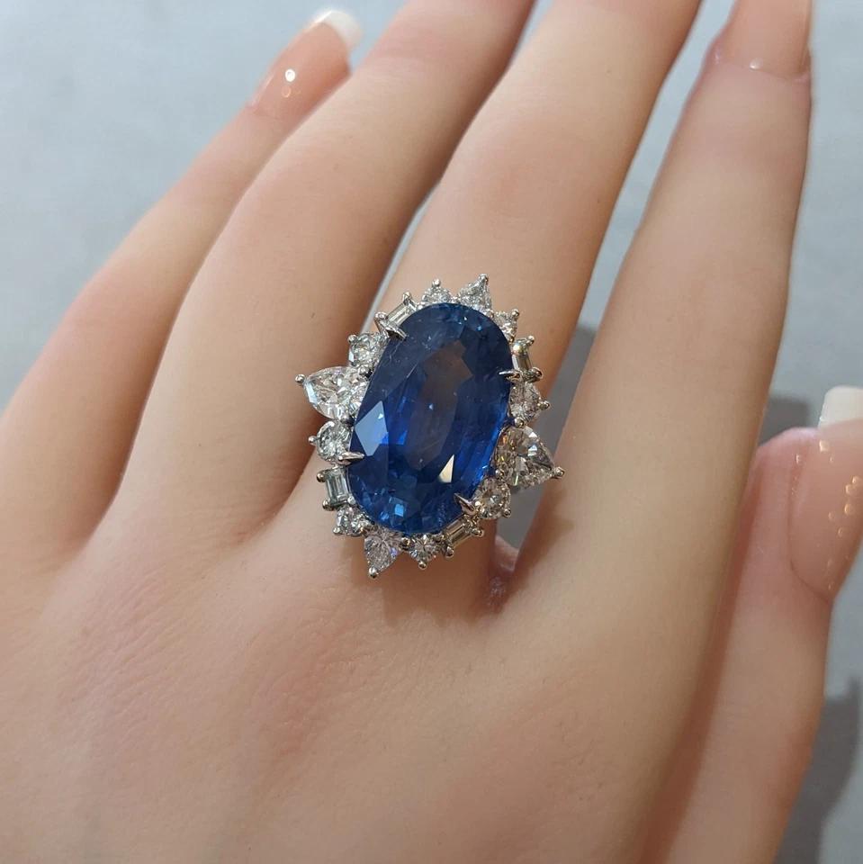 Certified Natural Oval Sapphire 19.17 carat and Diamond Ring in White Gold

Sapphire and Diamond Ring features a Large Oval Blue Sapphire from Ceylon accented by Pear-shaped, Baguette, and Round Diamonds, all set in 18k and 14k White Gold.

The