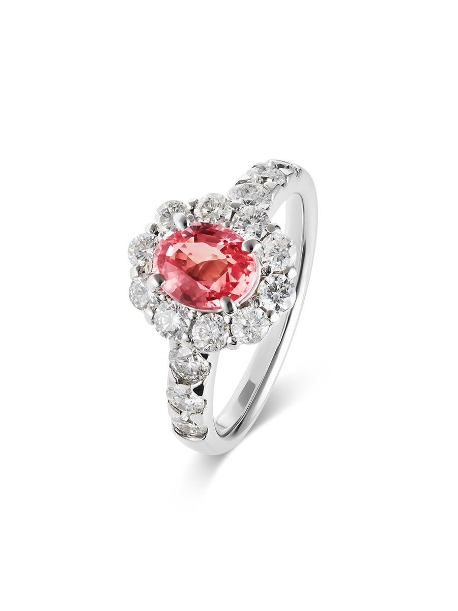 Gemstone:  Natural Padparadscha Sapphire
Weight of Sapphire : 1.08 carats
Conflict free natural diamonds. Weight of diamonds: 1.05 carats
Metal: Platinum 
Certificate: GIA (Gemological Institute of America) 

Condition Description:
In excellent
