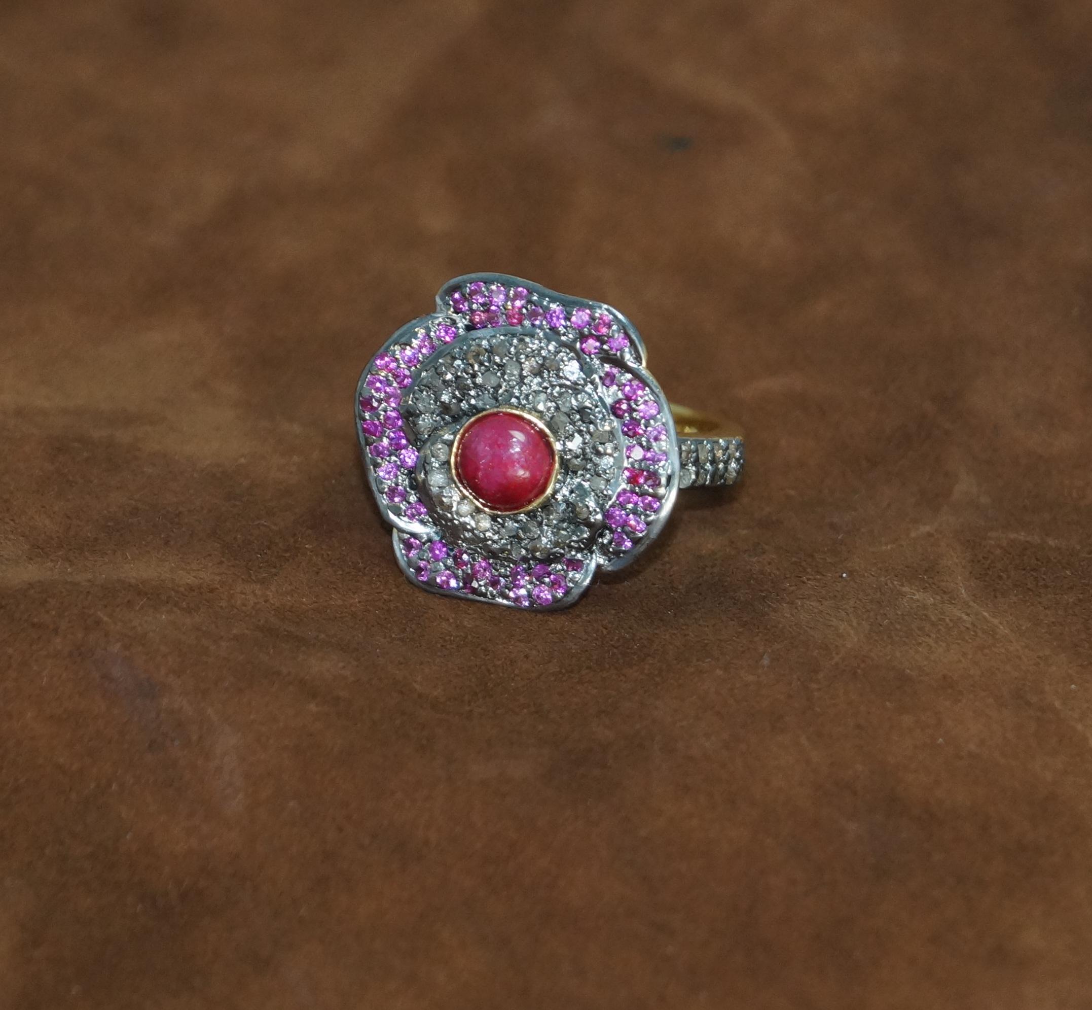 The ring consists of;
Diamond weight- 1.10cts
Diamond type- Natural pave diamonds
Diamond origin- Natural earth mined
Metal- Silver
Metal purity- 925 silver
Metal color- Oxidized silver
Gemstone- Ruby