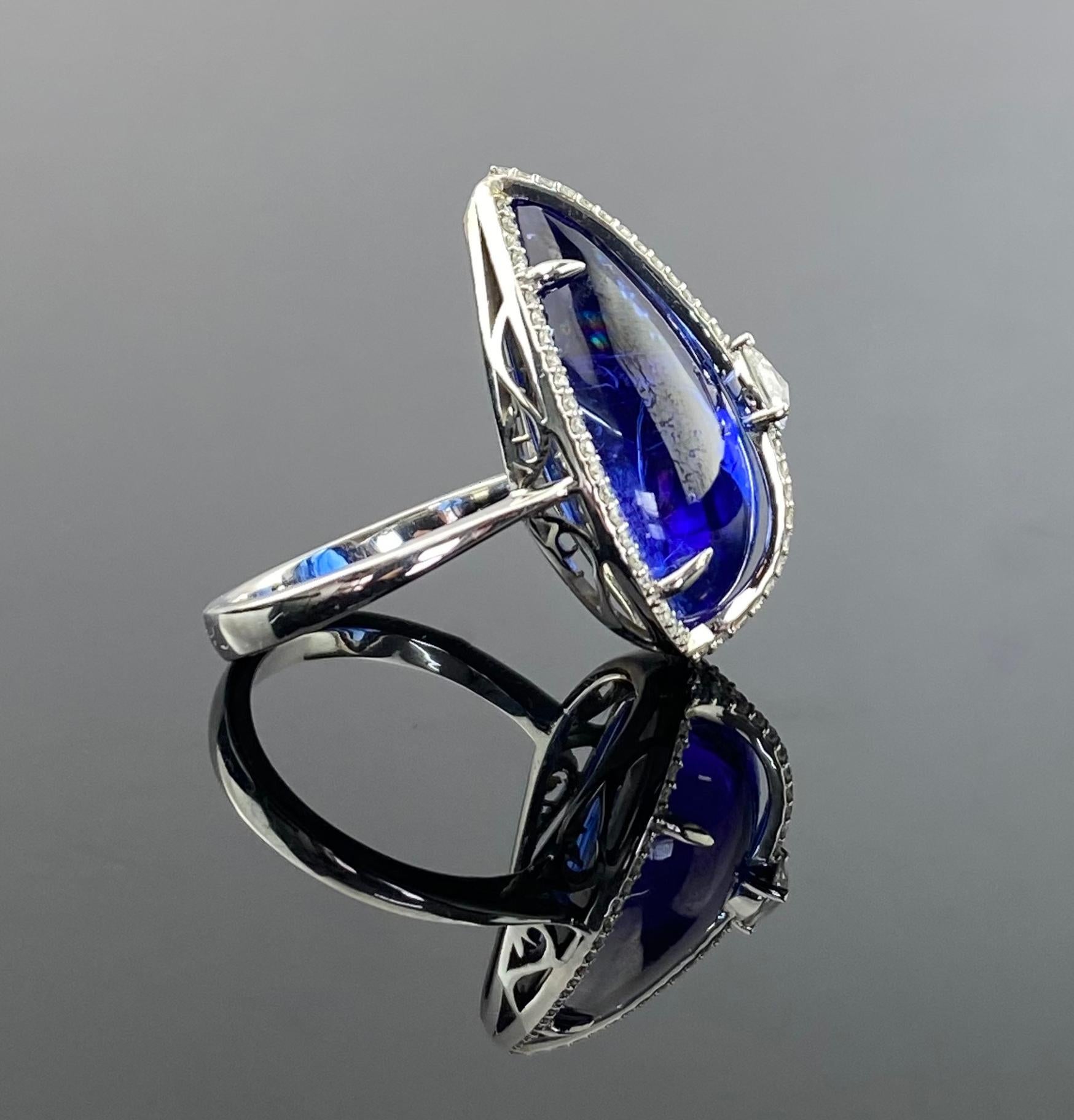 Modern Certified Natural Pear Shaped Cabochon Tanzanite Ring with VVS Diamond For Sale