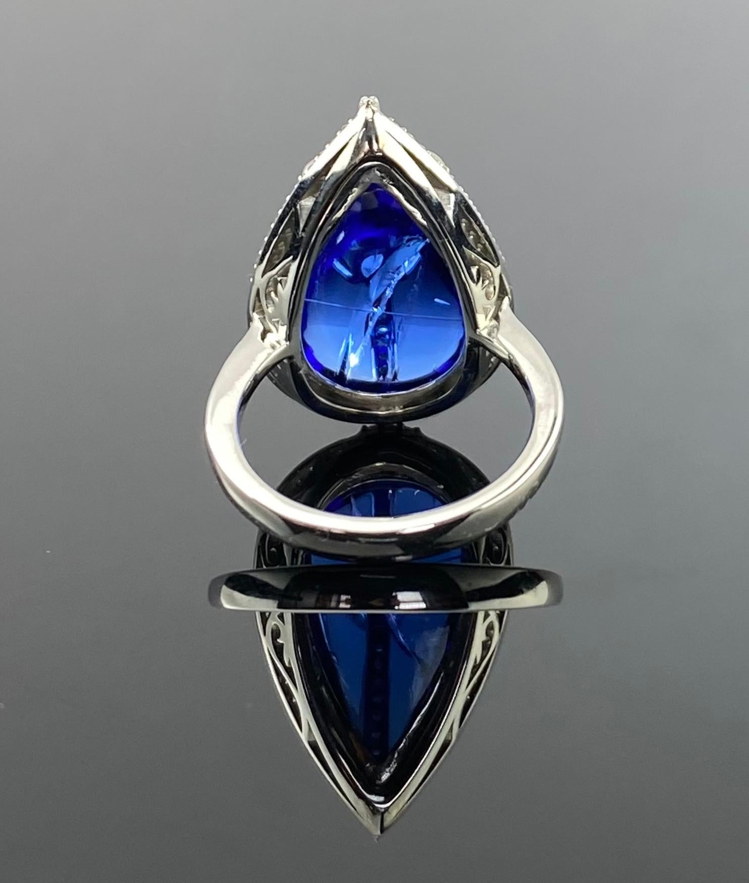 Modern Certified Natural Pear Shaped Cabochon Tanzanite Ring with VVS Diamond For Sale