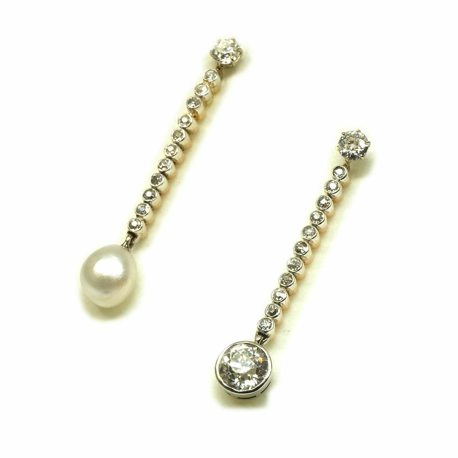 Certified natural pearl and 2.54 carat diamond gold Earrings, circa 1930

These long, elegant earrings featuring a 1.50 carat old European cut diamond and a natural saltwater pearl, hanging from a line of 12 diamonds, in total 2.54 carat.
 

14K  &