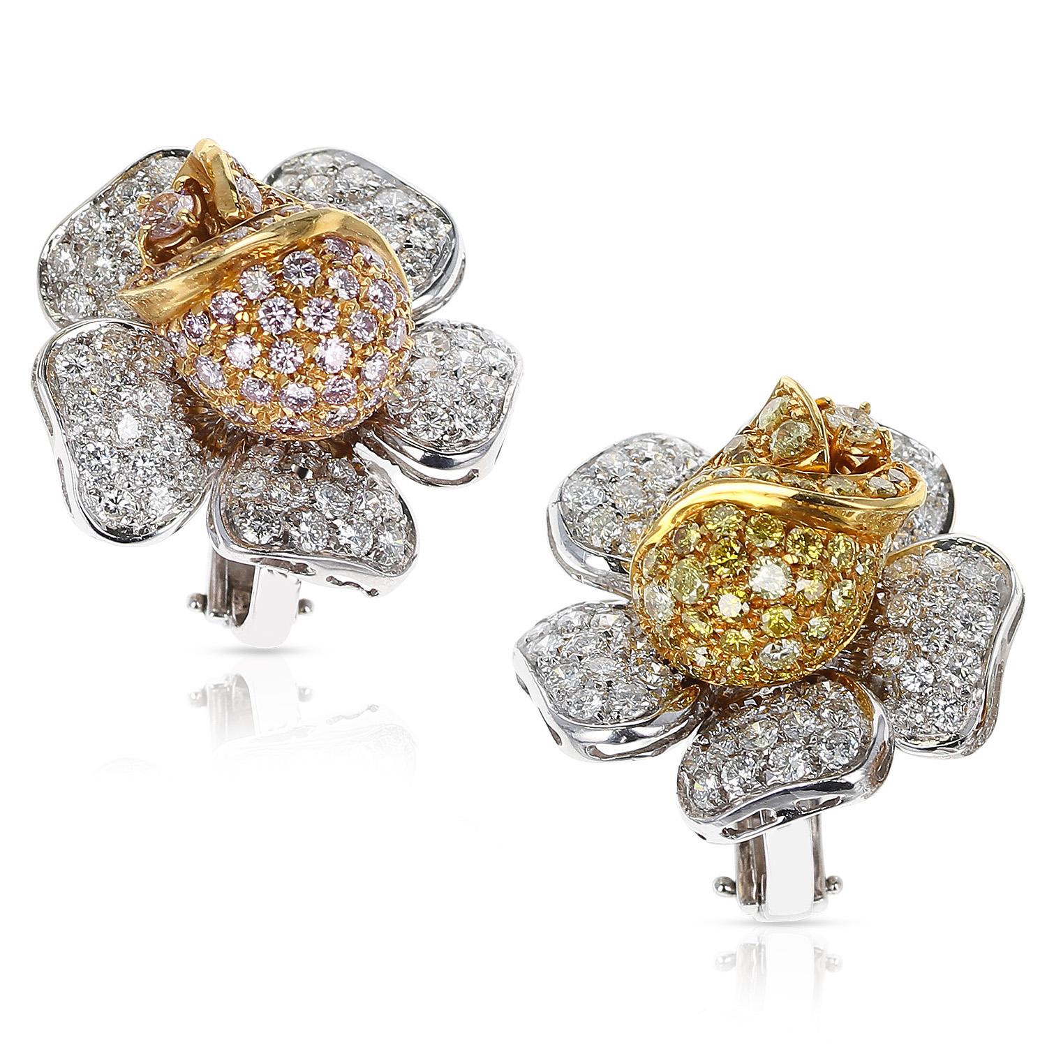 An exquisite and elegant pair of floral rose earrings, set with natural round brilliant-cut pink, yellow, and white diamonds in various eighteen-karat gold alloys. These unique earrings are constructed with approximately one-and-a-half carat natural