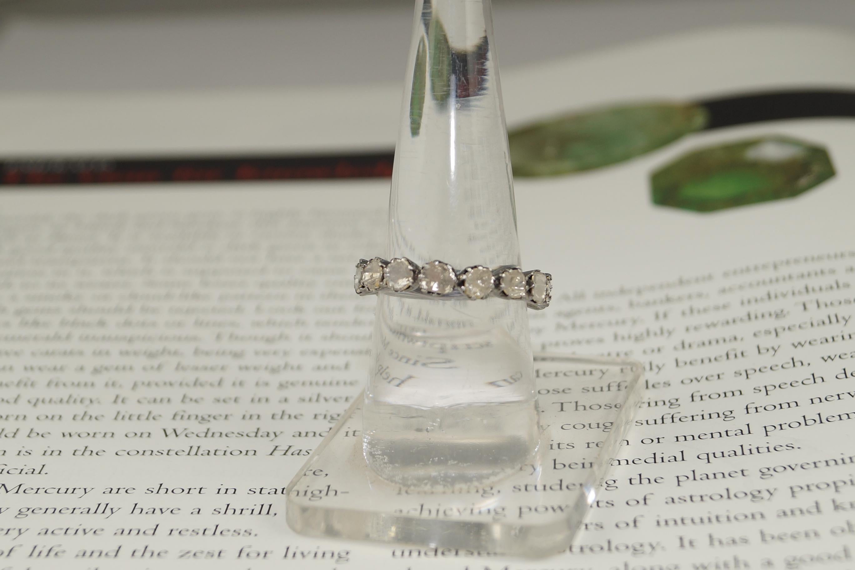 This gorgeous eternity band consists of following:
Diamond- uncut diamonds
Diamond weight- 2.30cts
Diamond color- White with a tint of yellow and brown
Metal- Silver
Purity- Sterling silver or 92.5% Silver
Ring sizing available upto - US 4 to US 10
