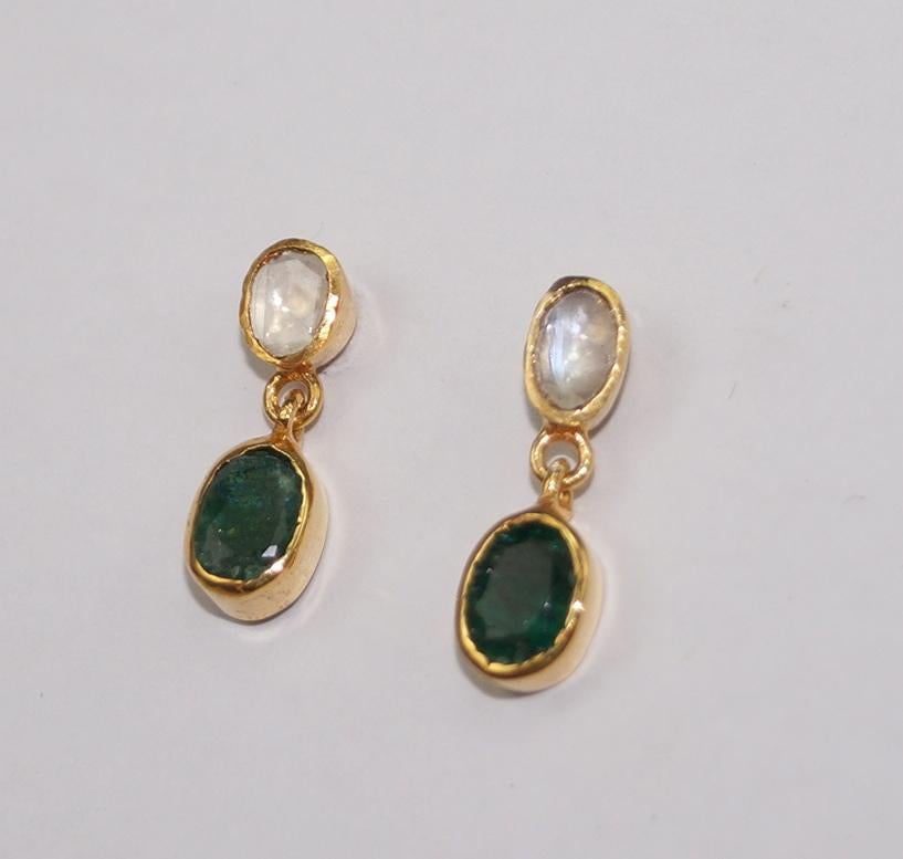 Stunning diamond silver emerald earrings consists of :

Metal- Silver
Metal Purity- sterling silver
Color of metal- Yellow gold plating 
Diamond- Natural uncut diamonds
Diamond origin- Natural earth mined
Diamond weight- 2.10cts
Gemstone- Natural