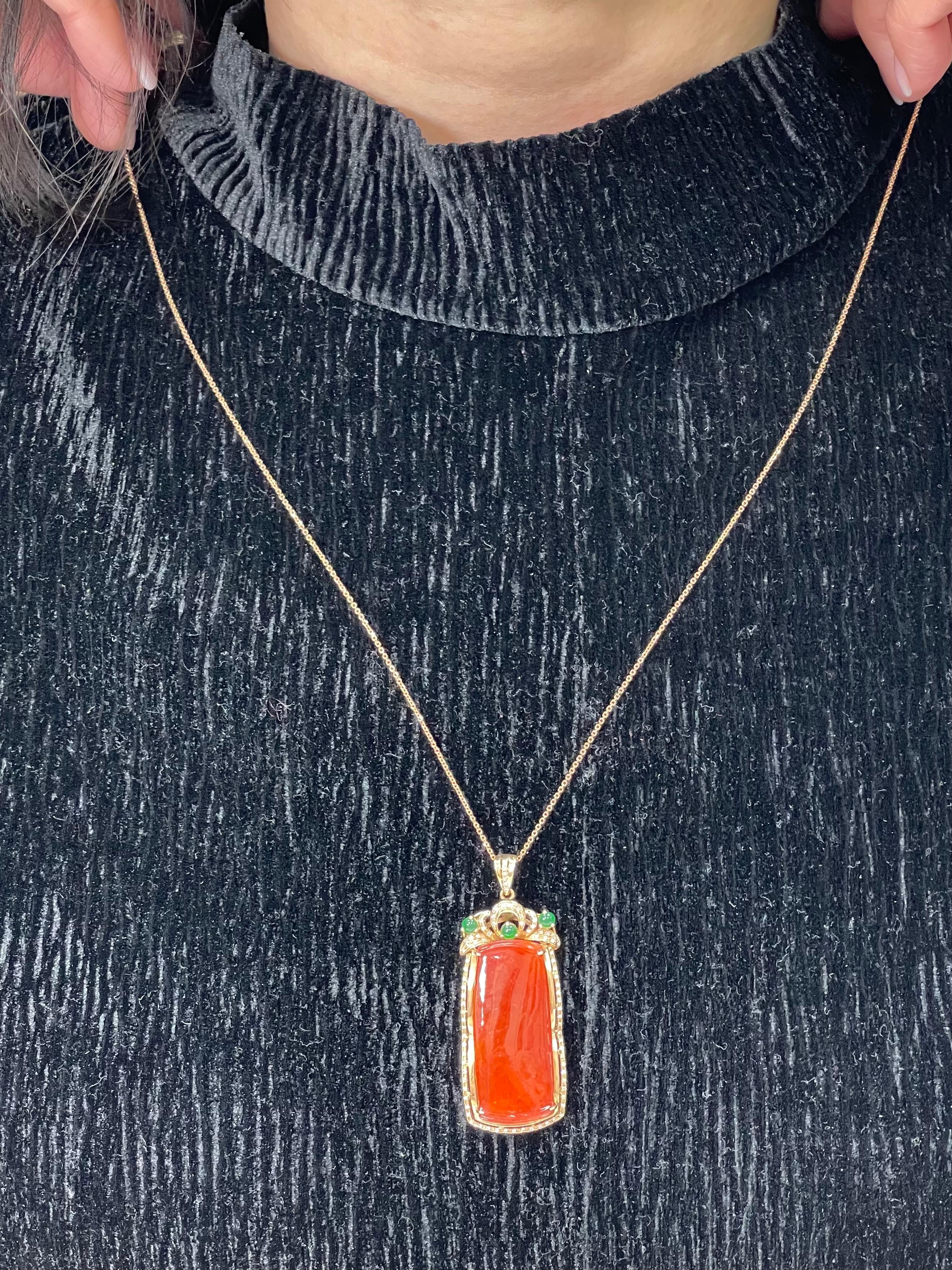 This certified natural red jadeite is not common. It is as beautiful from the front as it is from the back. A very unique design with hand etched (engraved) flower motif on reverse side. Here is a nice Jade pendant made with an eye catching 