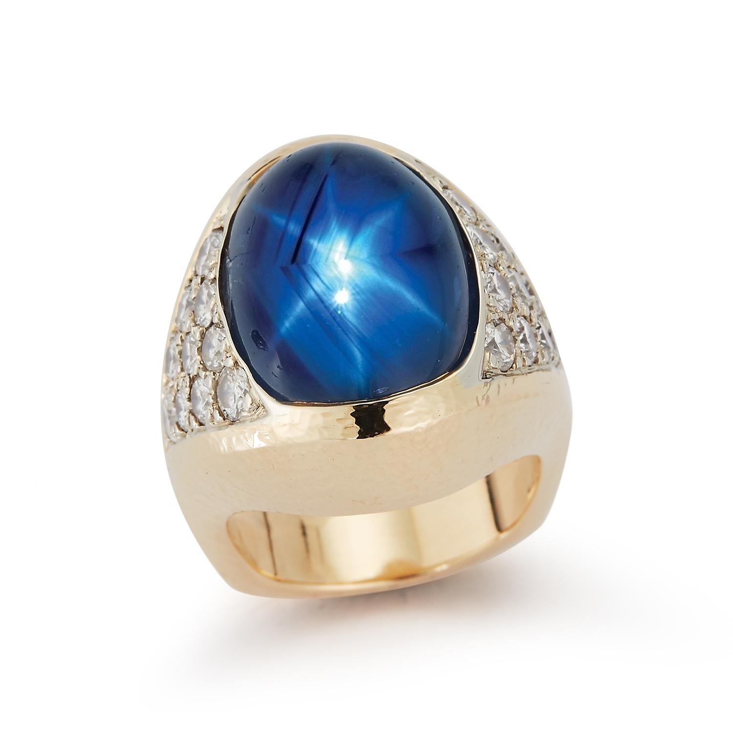 Certified Natural Star Sapphire Men's Ring by David Webb
Ring Size: 5
Resizable
The Sapphire is certified by AGL laboratory as being natural with no treatment whatsoever and of Ceylon origin
Signed David Webb
Very early David Webb
Gold Type: