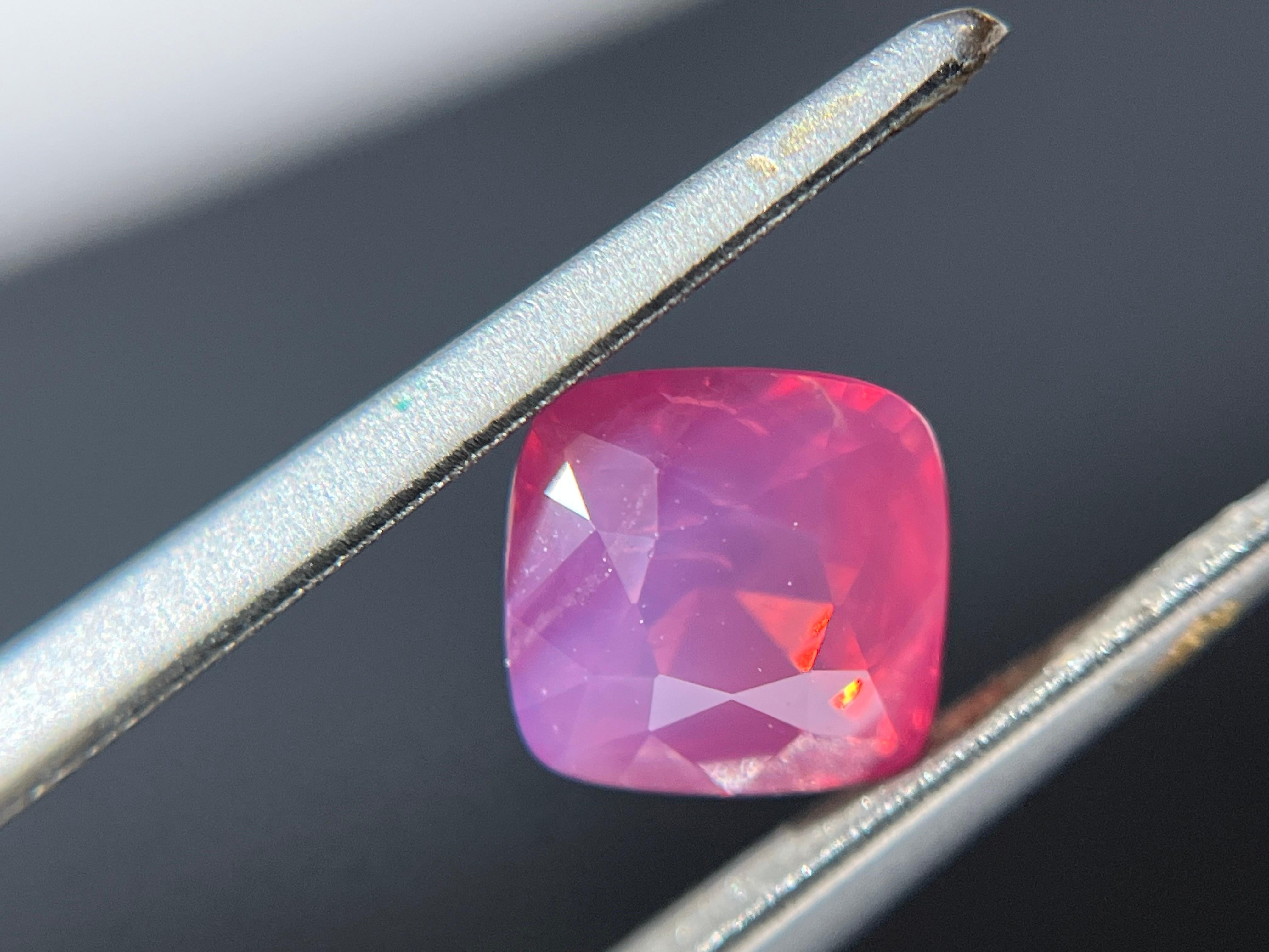 Introducing our exceptional Mahenge spinel with a silky body neon pink color and orange fire that is truly one-of-a-kind. This gemstone is a marvel of nature, with its rare and captivating hue that exudes warmth and vitality.

Sourced from the