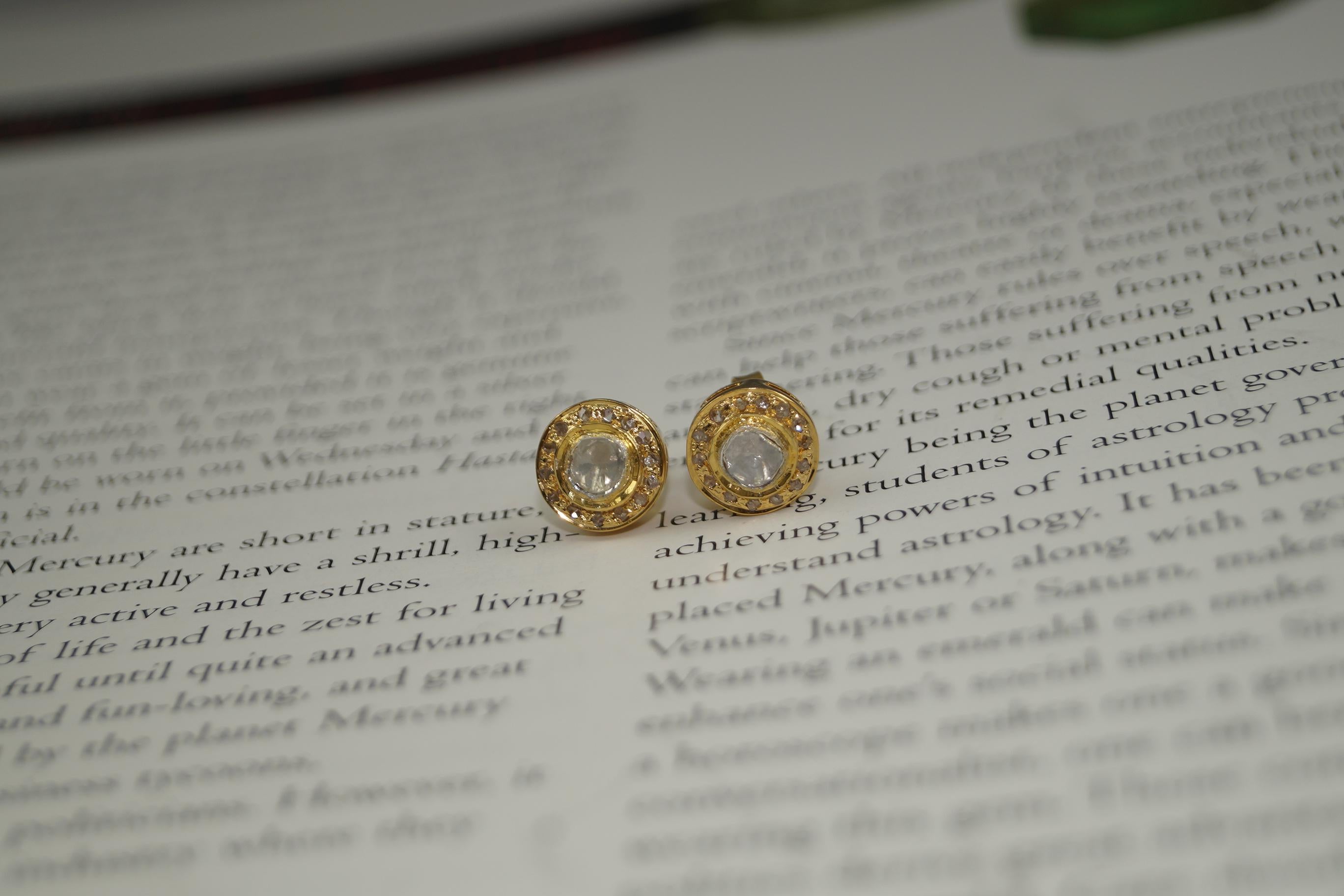 - **Material:** Sterling silver with 18K gold plating
- **Diamond solitaire**
  - Each earring features a beautiful uncut diamond, known for its radiant luster. The uncut diamonds are carefully selected for their exceptional quality and natural