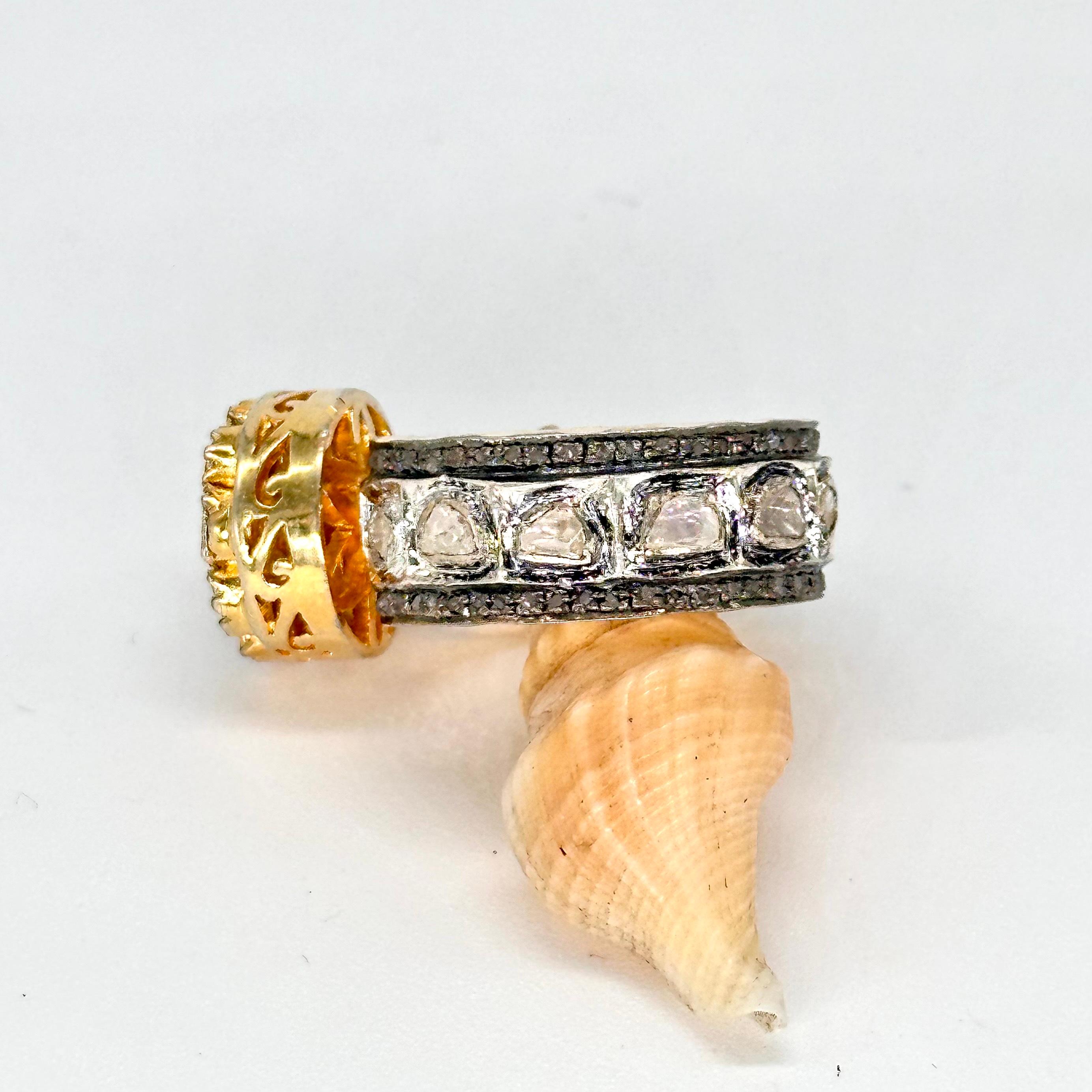 This gorgeous flower ring consists of salt and pepper diamond at the center around which the white diamonds are set to glorify its look.
This ring has the natural diamonds that go all around the band to add to its beauty.

-Diamond type- Natural