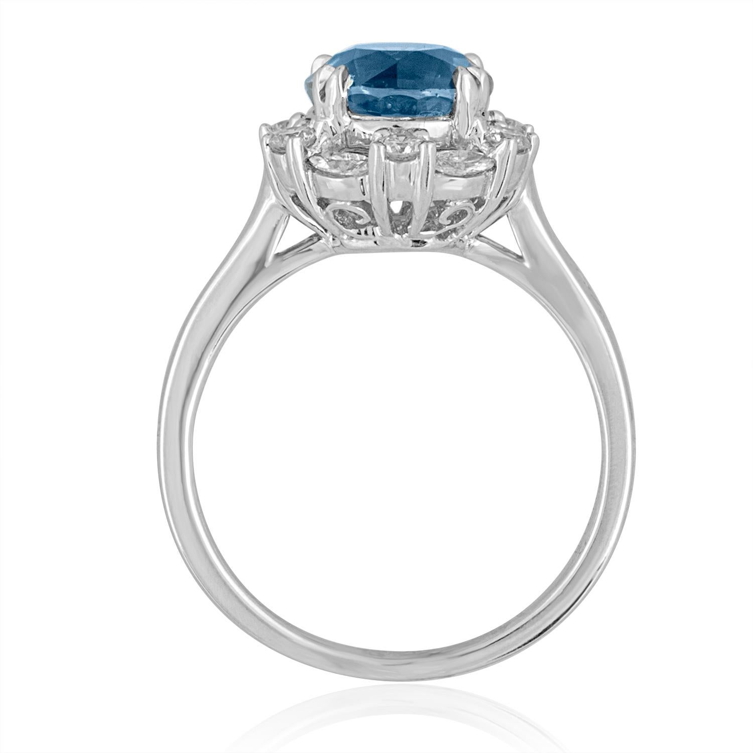 Beautiful Natural Sky Blue Sapphire Halo Diamond Ring
The ring is 18K White Gold
There are 0.49 Carats in Diamonds F/G VS/SI
The round sapphire is 2.97 Carats, NO HEAT.
The Sapphire is certified by LAPIS.
The ring is a size 6.75
The ring weighs 4.7