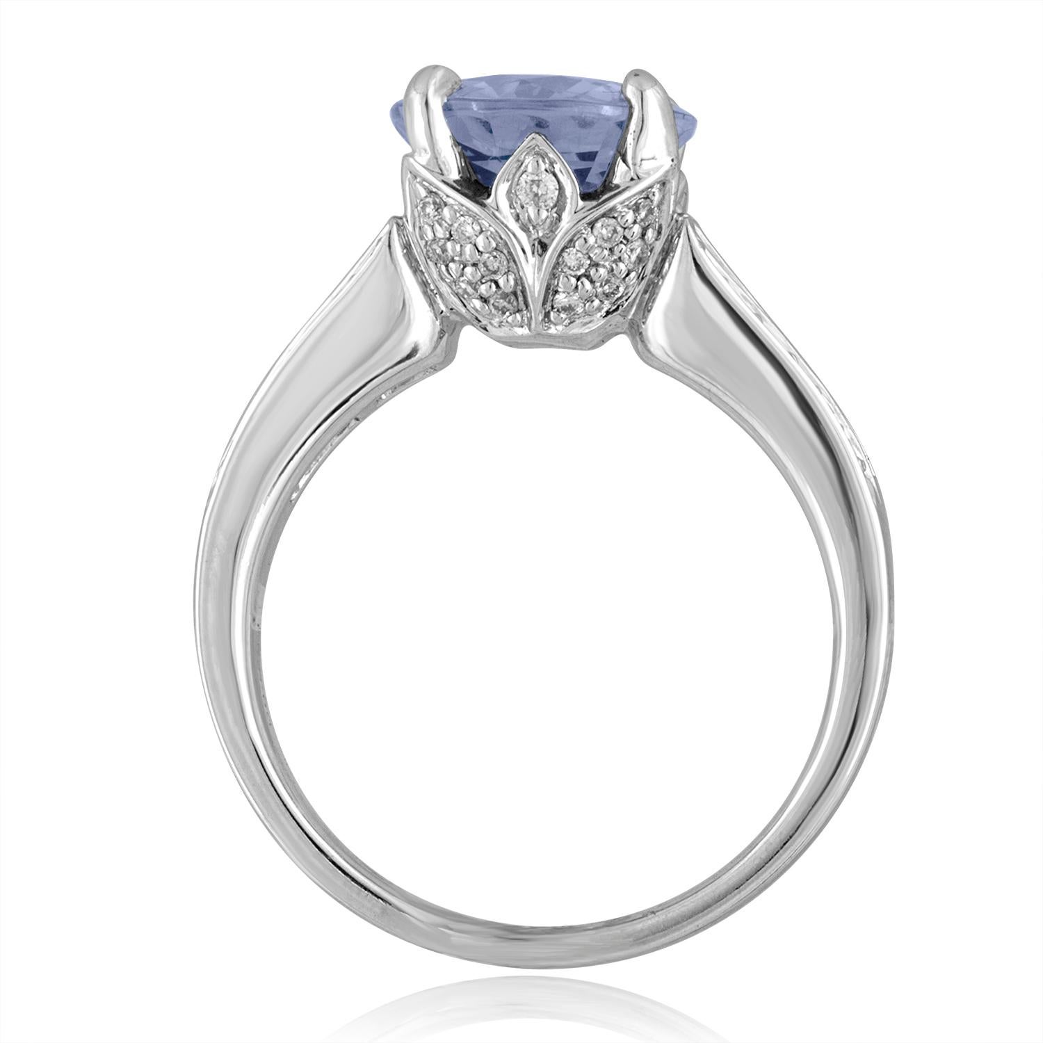 Natural Round Blue Sapphire and Diamond Ring
The ring is 18K White Gold
There 0.88 Carats in Diamonds F/G VS/SI
The Round Blue Sapphire 3.02 Carat NO HEAT
The Sapphire is Certified by LAPIS
The ring is a size 6.75, sizable
The ring weighs 8.1 grams