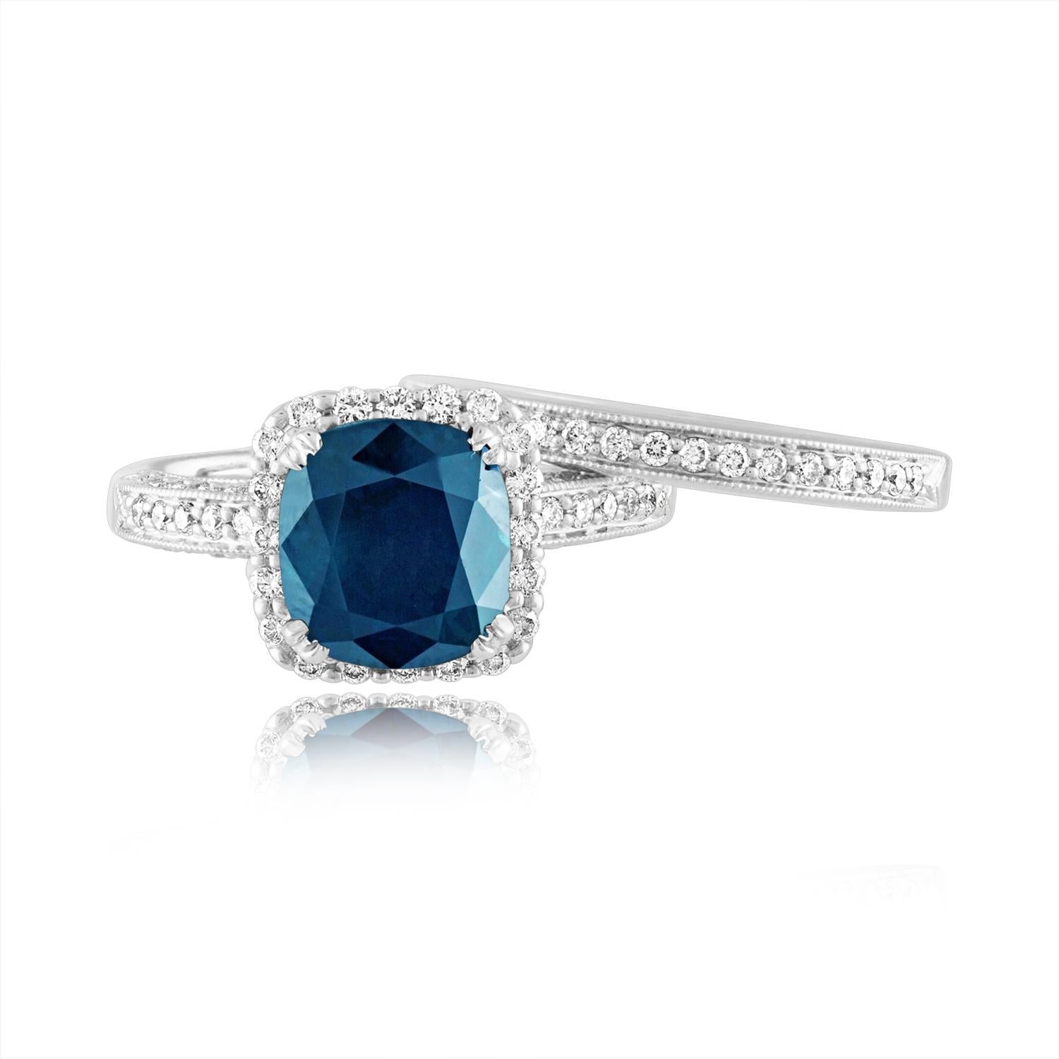 Beautiful Classic Sapphire & Diamond Wedding Set
The ring and band have milgrain design.
The ring and band are both 18K White Gold.
The Blue Sapphire is Cushion Cut and is 4.22 Carats
The sapphire has NO HEAT and is certified by LAPIS.
The ring has