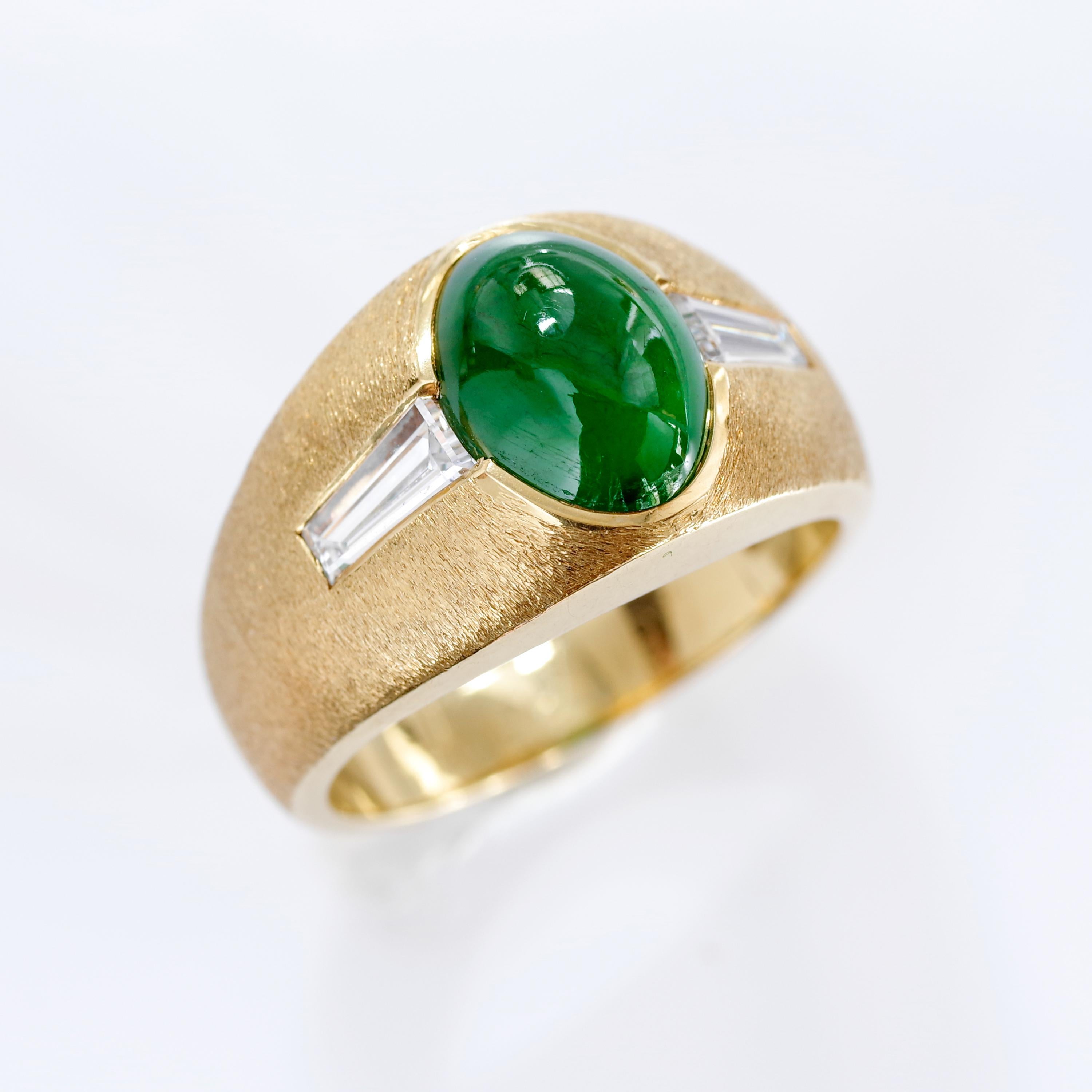 This 18k greenish-gold hand-crafted Mid-Century ring features a certified natural and untreated, highly-polished, medium-dark green Burmese omphacite jade cabochon that represents jade's most prized color. Two sleek, white and clean (H-I, VS2)