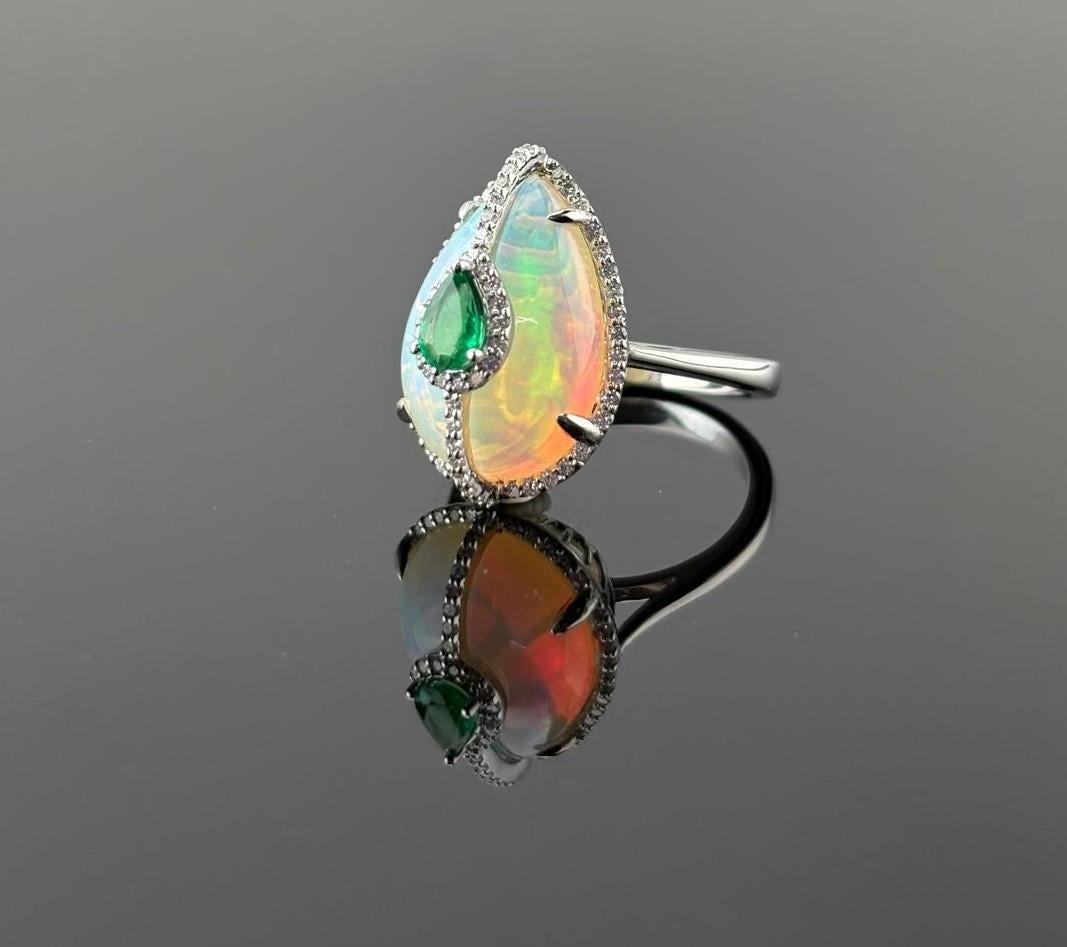 Modern Certified Opal 18KT White Gold, Diamonds And Emerald Cocktail Ring For Sale
