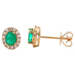 Certified Oval Cut Emerald & Diamond Halo Stud Earring in 14K Gold
