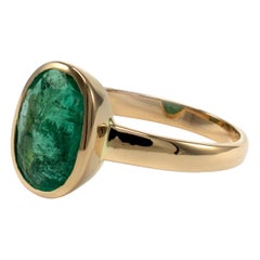 Certified Oval Emerald Solitaire Bezel Setting 18 Karat Gold Contemporary Rings