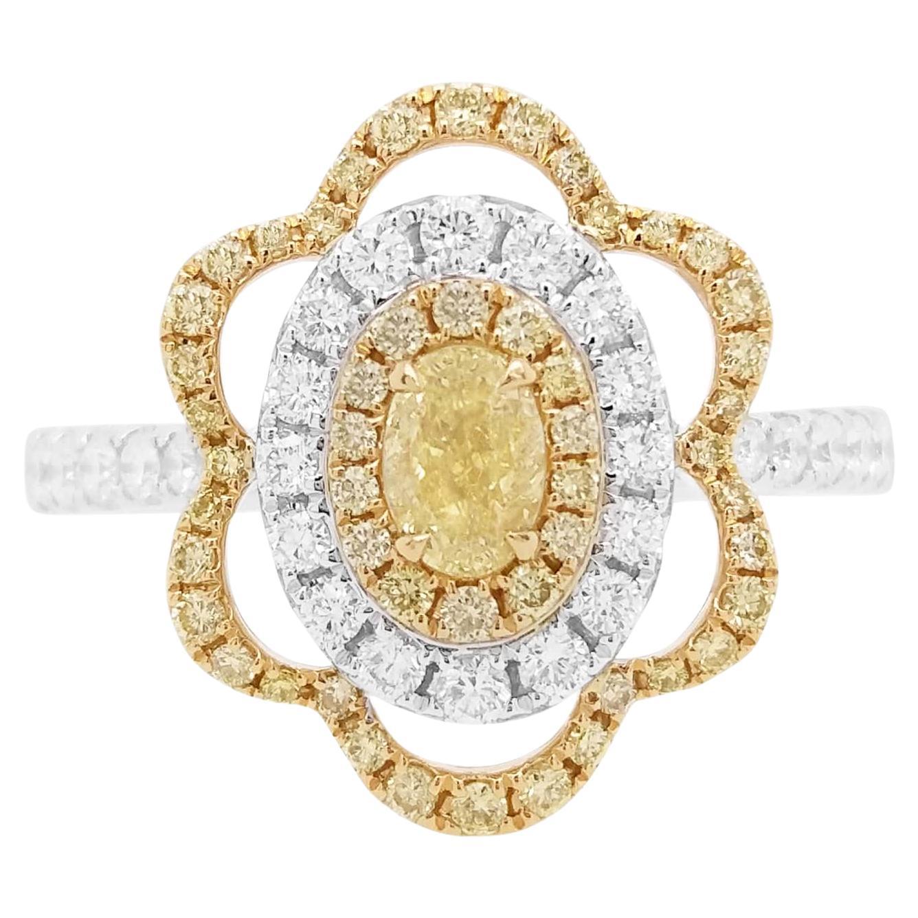 Anello con diamante bianco certificato di forma ovale con diamante giallo intenso Nature Fancy