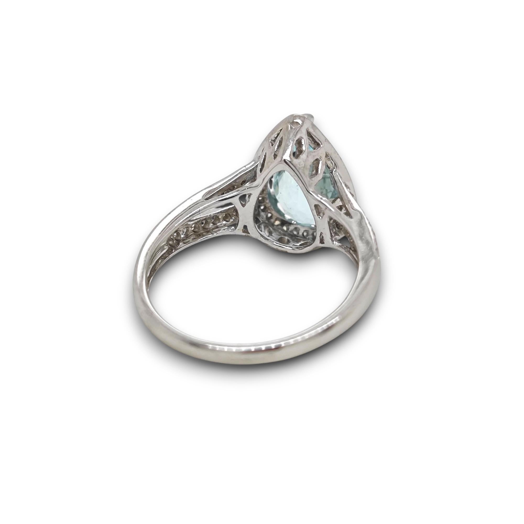 1 Oval Paraiba Tourmaline Gemstone: 1.66 Carats
68 White Round Diamonds: 0.19 Carats
Metal: 18K White Gold, 3.40 Grams

Certificate: AAP57361
