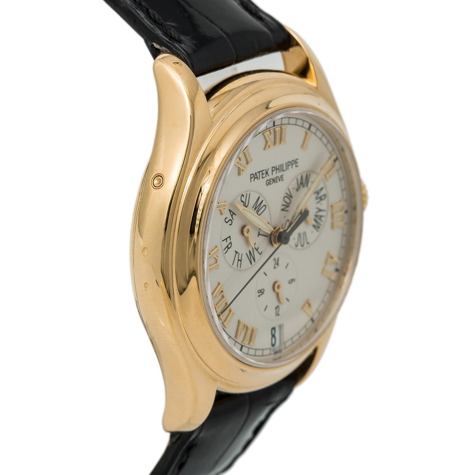 Contemporary Certified: Patek Philippe Annual Calendar Mens Automatic Watch Cream Dial 18K YG